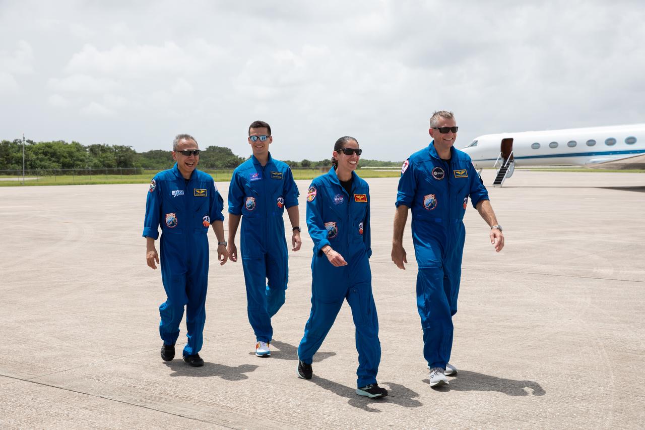 Crewmates for NASA’s SpaceX Crew-7 mission to the International Space Station walk along the runway at the Launch and Landing Facility at Kennedy Space Center in Florida on Sunday, Aug. 20, 2023. From left, JAXA (Japan Aerospace Exploration Agency) astronaut Satoshi Furukawa, Roscosmos cosmonaut Konstantin Borisov, NASA astronaut Jasmin Moghbeli, and ESA (European Space Agency) astronaut Andreas Mogensen will launch aboard a SpaceX Dragon spacecraft and Falcon 9 rocket at 3:49 a.m. EDT Friday, Aug. 25, 2023, from Kennedy’s Launch Complex 39A.