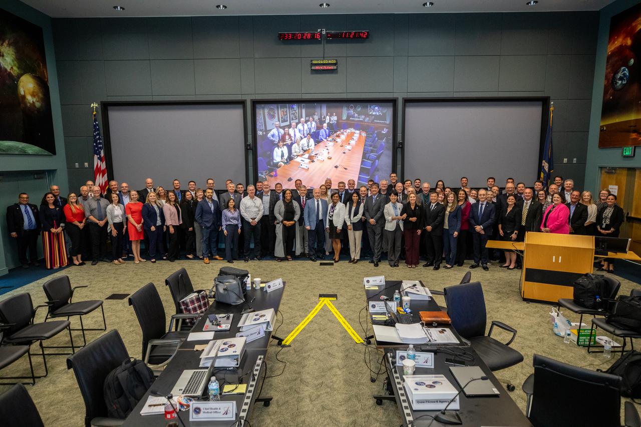 Managers with NASA and SpaceX, along with international partners, pose for a photo after completion of NASA’s SpaceX Crew-7 Flight Readiness Review at Kennedy Space Center on Monday, Aug. 21, 2023. The mission is targeted to lift off from the Florida spaceport’s Launch Complex 39A at 3:49 a.m. EDT Friday, Aug. 25, 2023. NASA astronaut Jasmin Moghbeli, ESA (European Space Agency) astronaut Andreas Mogensen, JAXA (Japan Aerospace Exploration Agency) astronaut Satoshi Furukawa, and Roscosmos cosmonaut Konstantin Borisov will fly to the International Space Station aboard SpaceX’s Dragon spacecraft, powered by the company’s Falcon 9 rocket.
