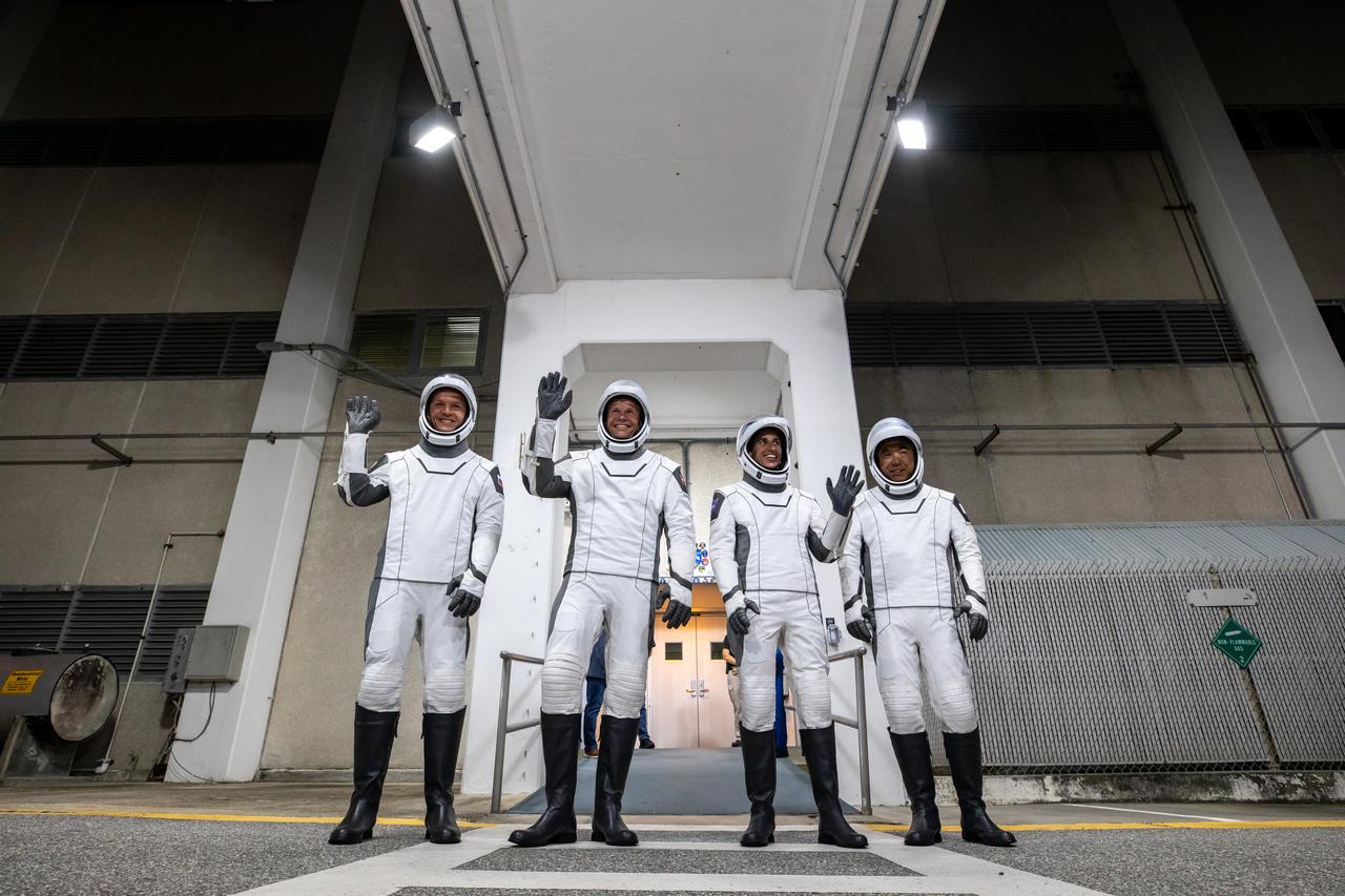 NASA’s SpaceX Crew-7 crew members stand outside of the Neil A. Armstrong Operations and Checkout Building on Tuesday, Aug. 22, 2023, at the agency’s Kennedy Space Center in Florida. They were participating in a countdown dress rehearsal to prepare for the upcoming mission launch. From left are Roscosmos cosmonaut Konstantin Borisov, ESA (European Space Agency) astronaut Andreas Mogensen, NASA astronaut Jasmin Moghbeli, and JAXA (Japan Aerospace Exploration Agency) astronaut Satoshi Furukawa. The crew will launch to the International Space Station aboard SpaceX’s Dragon spacecraft on the company’s Falcon 9 rocket. Liftoff is targeted for 3:49 a.m. EDT Friday, Aug. 25, 2023, from Kennedy’s Launch Complex 39A.