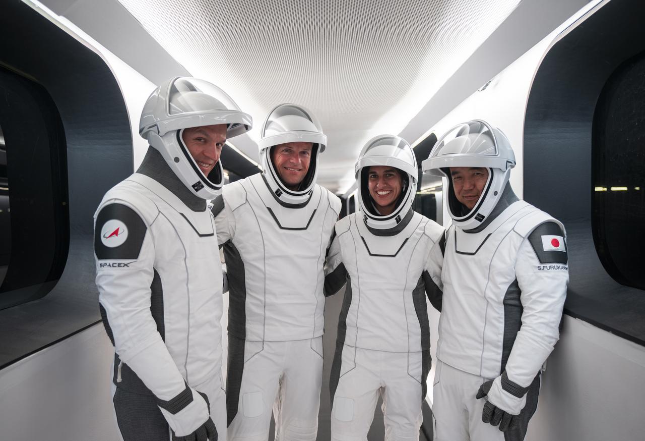 From left, Roscosmos cosmonaut Konstantin Borisov, ESA (European Space Agency) astronaut Andreas Mogensen, NASA astronaut Jasmin Moghbeli, and JAXA (Japan Aerospace Exploration Agency) astronaut Satoshi Furukawa pose inside the crew access arm as part of a countdown dress rehearsal for NASA’s SpaceX Crew-7 mission at the agency’s Kennedy Space Center in Florida on Tuesday, Aug. 22, 2023. The four crewmates will fly to the International Space Station for a six-month rotation, conducting research and science experiments. Liftoff is targeted for 3:50 a.m. EDT Friday, Aug. 25, 2023.
