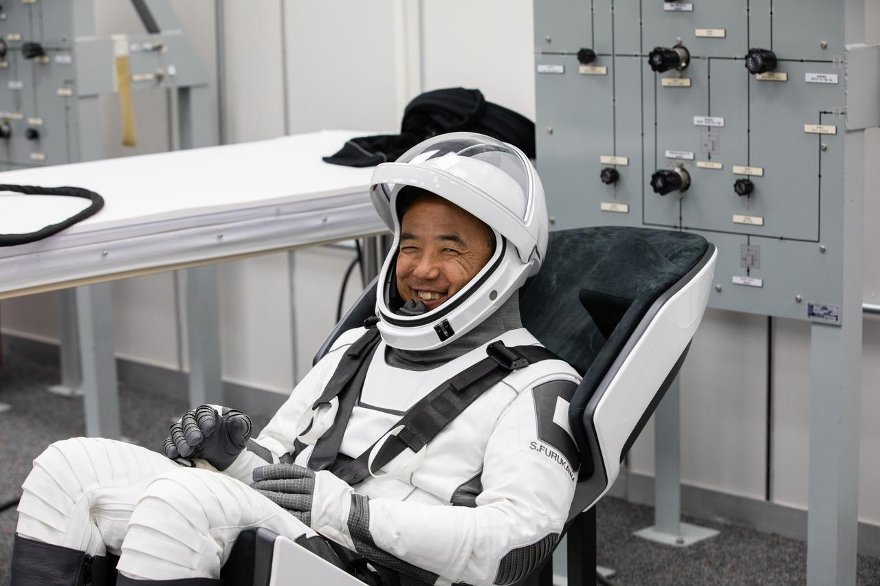 NASA’s SpaceX Crew-7 JAXA (Japan Aerospace Exploration Agency) astronaut Satoshi Furukawa relaxes in the suit-up room in the Astronaut Crew Quarters inside Kennedy Space Center’s Neil A. Armstrong Operations and Checkout Building a few hours before launch. A team of SpaceX suit technicians assisted the crew as they put on their custom-fitted spacesuits and checked the suits for leaks. Furukawa, along with NASA astronaut Jasmin Moghbeli, ESA (European Space Agency) astronaut Andreas Mogensen, and Roscosmos cosmonaut Konstantin Borisov, will launch aboard SpaceX’s Dragon spacecraft and Falcon 9 rocket to the International Space Station as part of NASA’s Commercial Crew Program. Launch is set for 3:27 a.m. EDT Saturday, Aug. 26, from Kennedy’s Launch Complex 39A. 