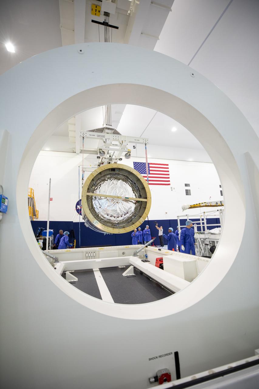 The Northrop Grumman Cygnus spacecraft’s pressurized cargo module (PCM) for the company’s 20th commercial resupply mission is lifted and moved by crane inside the high bay in the Space Station Processing Facility at NASA’s Kennedy Space Center in Florida on Monday, Sept. 18, 2023. The next step is vehicle processing for the mission to the International Space Station. Liftoff, aboard a SpaceX Falcon 9 rocket, will be from Cape Canaveral Space Force Station’s Space Launch Complex 40.