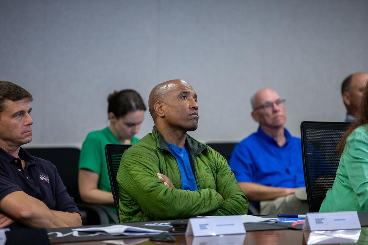 NASA astronauts Reid Wiseman (left) and Victor Glover (right) participate in an Artemis II pre-task briefing on Tuesday, Sept. 19, 2023, held in the Rocco A. Petrone Launch Control Center at NASA’s Kennedy Space Center in Florida. The briefing allows teams to collaborate ahead of a series of integrated system verification and validation tests conducted at Kennedy to evaluate the readiness of the crew and ground equipment ahead of launch day.  
