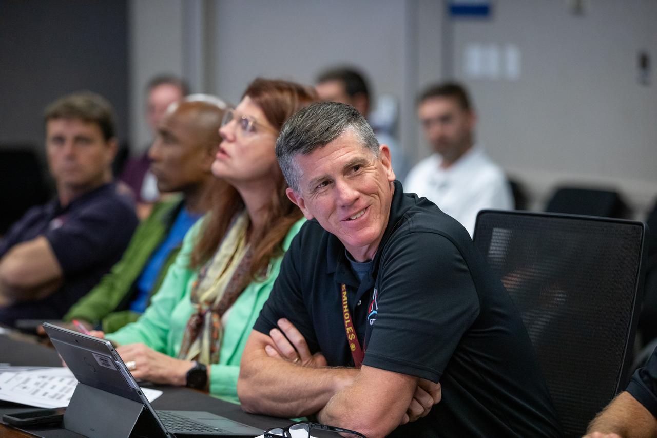 NASA astronauts Reid Wiseman and Victor Glover participate in an Artemis II pre-task briefing alongside NASA Artemis Launch Director Charlie Blackwell-Thompson and Assistant Launch Director Jeremy Graeber on Tuesday, Sept. 19, 2023, held in the Rocco A. Petrone Launch Control Center at NASA’s Kennedy Space Center in Florida. The briefing allows teams to collaborate ahead of a series of integrated system verification and validation tests conducted at Kennedy to evaluate the readiness of the crew and ground equipment ahead of launch day.