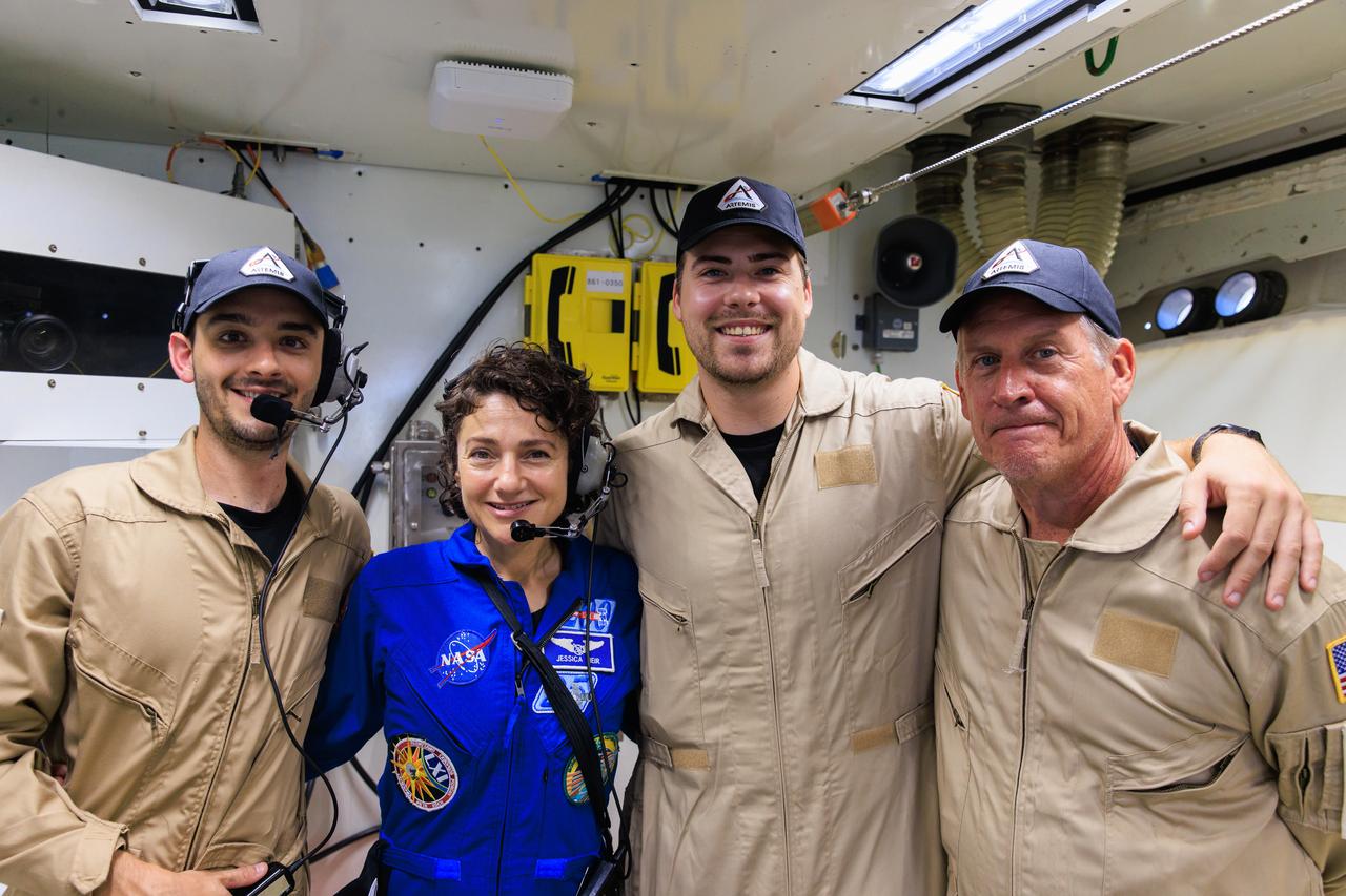 NASA astronaut Jessica Meir poses with members of the closeout team during in the white room on the crew access arm of the mobile launcher at Launch Pad 39B as part of an Artemis II integrated ground systems test at Kennedy Space Center in Florida on Wednesday, Sept. 20, 2023. The test ensures the ground systems team is ready to support the crew timeline on launch day.