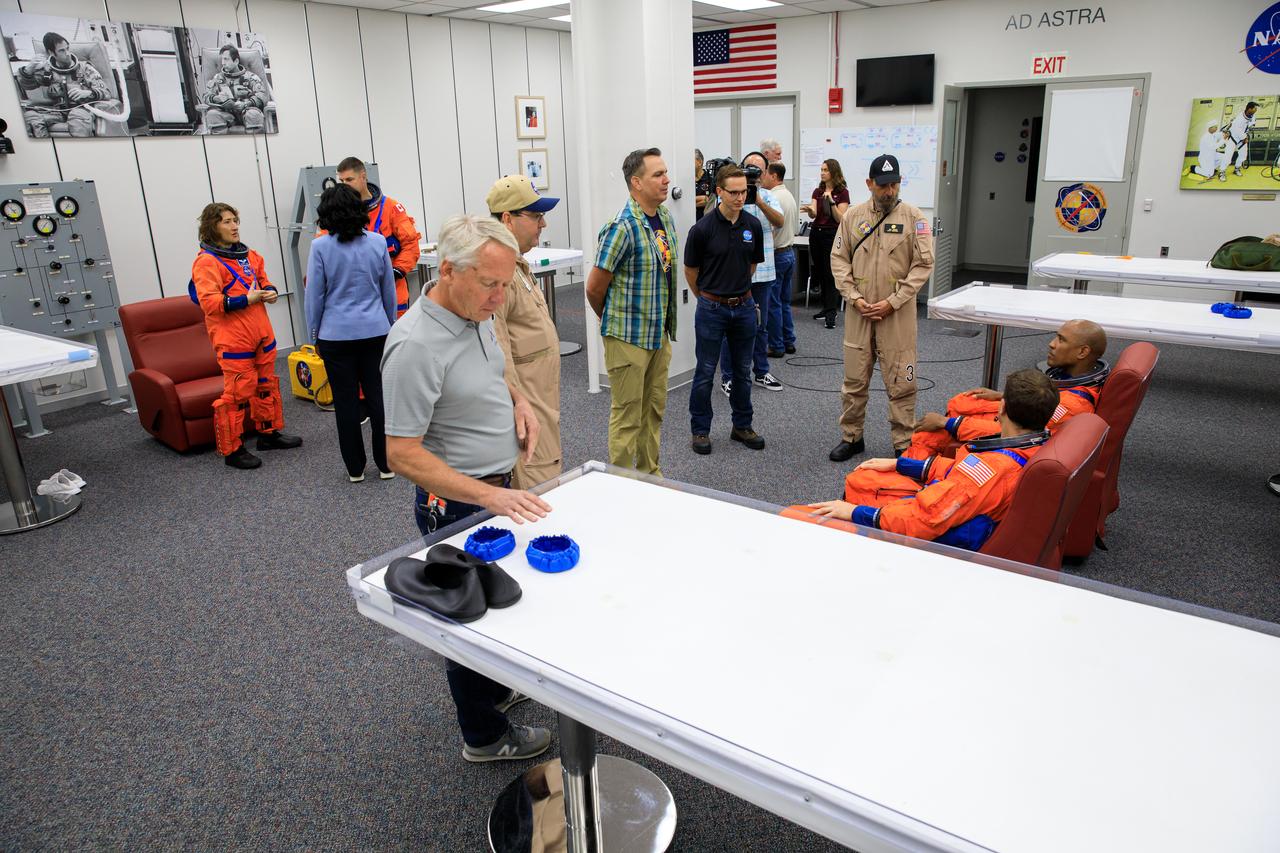 Inside the Astronaut Crew Quarters at the Neil Armstrong Operations and Checkout Building at NASA’s Kennedy Space Center in Florida, Artemis II crew members NASA astronauts Reid Wiseman, Victor Glover, and Christina Koch, and CSA (Canadian Space Agency) astronaut Jeremy Hansen are shown wearing test versions of the Orion crew survival system spacesuits they will wear on launch day as part of an integrated ground systems test on Wednesday, Sept. 20. 