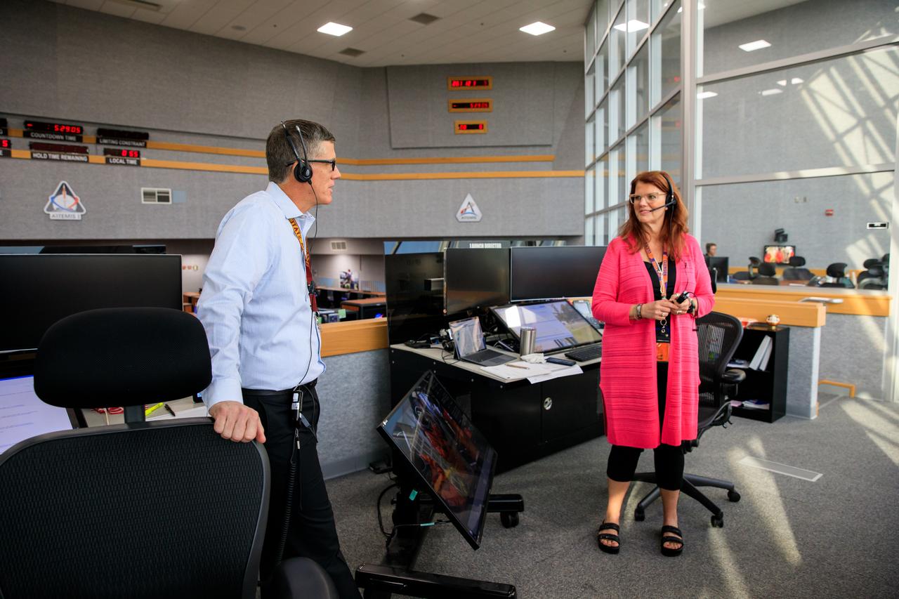 Assistant Artemis Launch Director Jeremy Graeber (left) and NASA Artemis Launch Director Charlie Blackwell-Thompson monitor activities during the launch day demonstration for one of the Artemis II integrated ground systems tests inside Firing Room 1 in the Launch Control Center at Kennedy Space Center in Florida on Wednesday, Sept. 20. This is part of a series of tests to ensure the ground systems team is ready to support the crew timeline on launch day. Artemis II is the first mission with astronauts under Artemis that will test and check out all of the Orion spacecraft’s systems needed for future crewed missions.