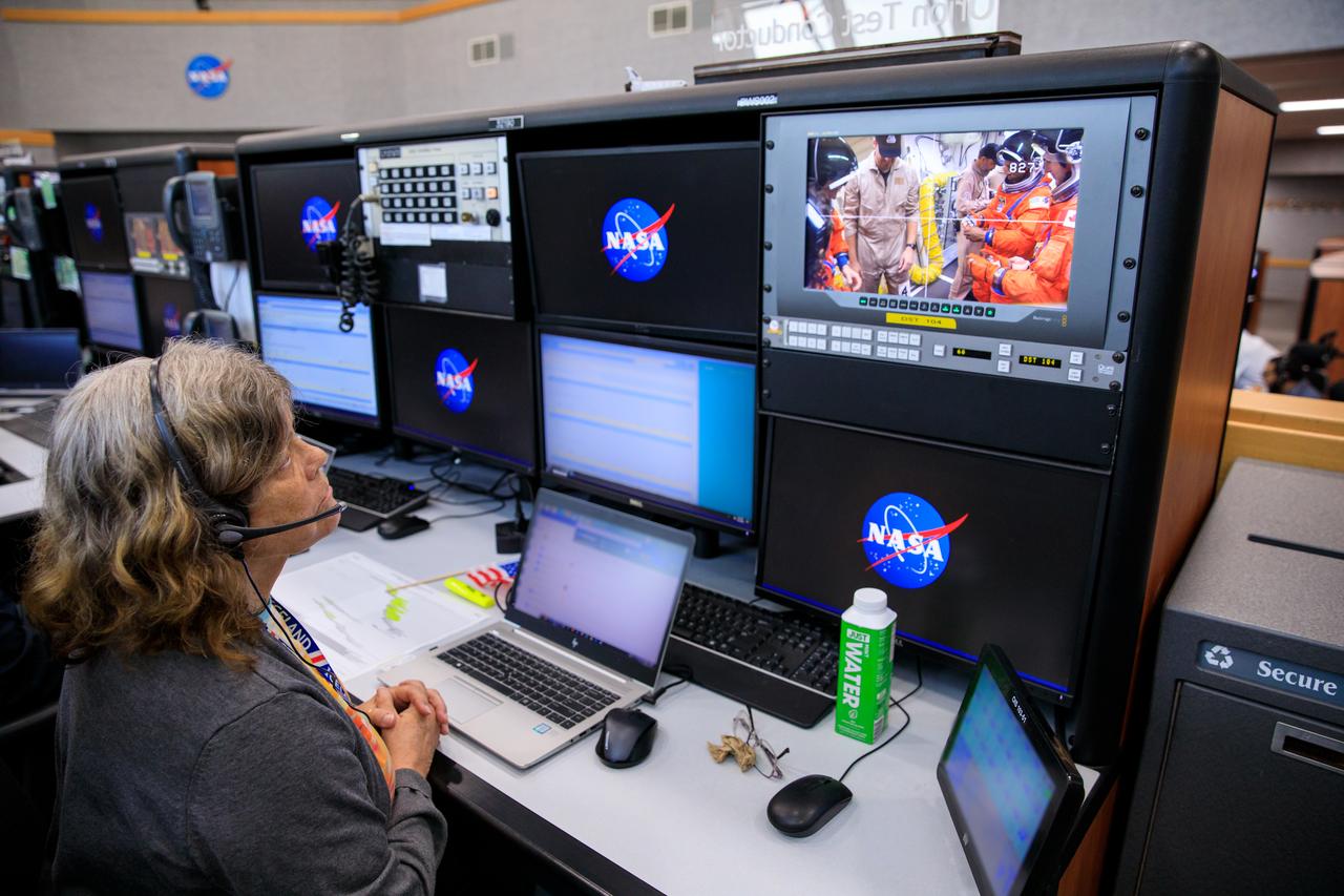 A member of the Artemis II launch team monitors activities during the launch day demonstration for one of the Artemis II integrated ground systems tests from Firing Room 1 in the Launch Control Center at Kennedy Space Center in Florida on Wednesday, Sept. 20. This is part of a series of tests to ensure the ground systems team is ready to support the crew timeline on launch day. Artemis II is the first mission with astronauts under Artemis that will test and check out all of the Orion spacecraft’s systems needed for future crewed missions.