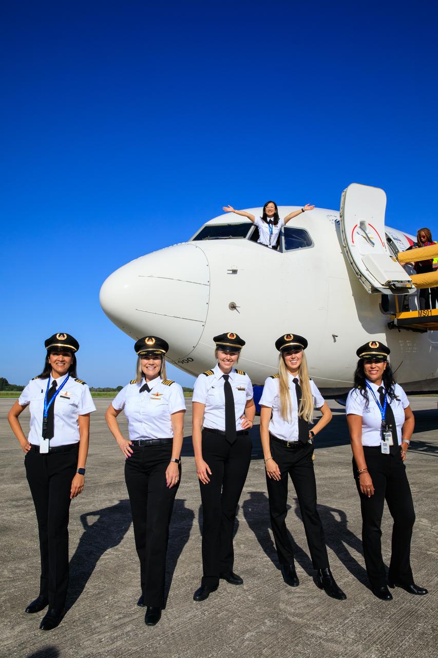 The all-female flight crew for Delta Air Lines’ Women Inspiring Our Next Generation (WING) flight poses for a photograph after touching down at the Launch and Landing Facility at NASA’s Kennedy Space Center on Friday, Sept. 22, 2023. The flight brought girls from Atlanta, Georgia, ranging in age from 12 to 18, to learn about the various careers available at the Florida spaceport. While at Kennedy, the group had the opportunity to view center facilities, hear from a panel of women with a combination of careers from Kennedy and Delta, and tour the visitor complex.