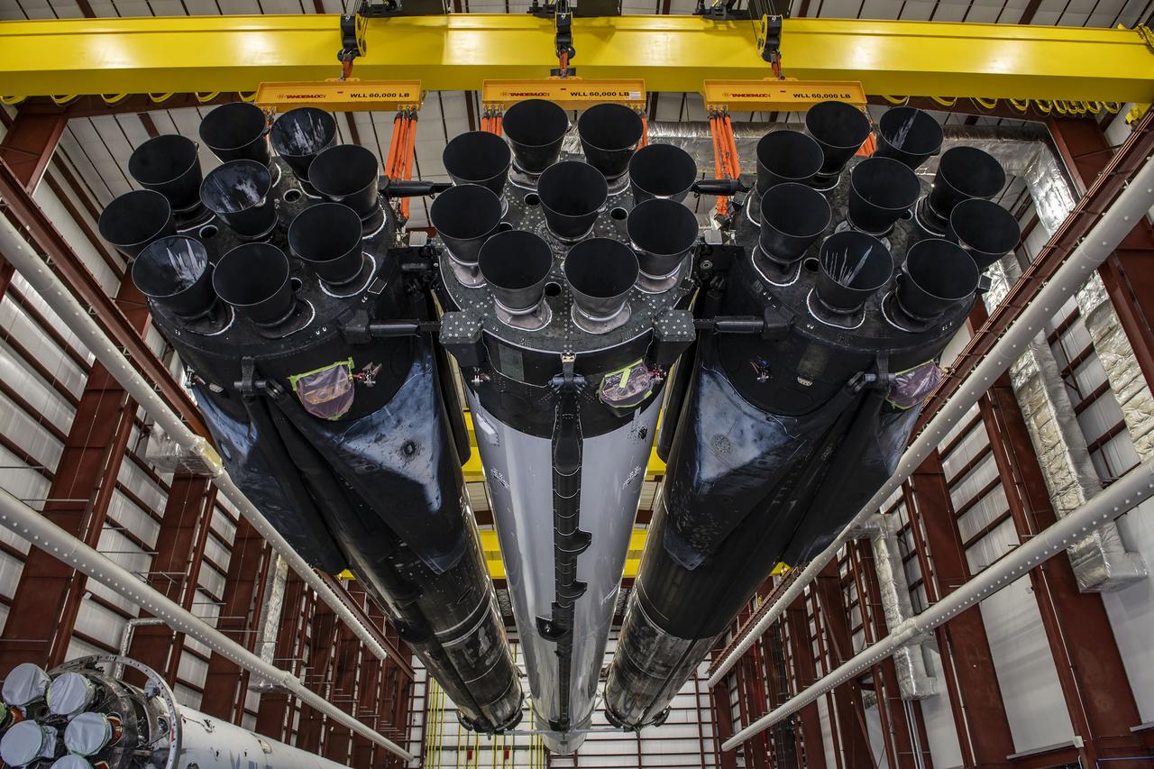 Photos of the Falcon Heavy rocket that will launch NASA's Psyche mission in the hangar at Launch Complex 39A at Kennedy Space Center in Florida before it rolled out to the pad for a static fire test as part of preparations for the journey to a metal-rich asteroid. 