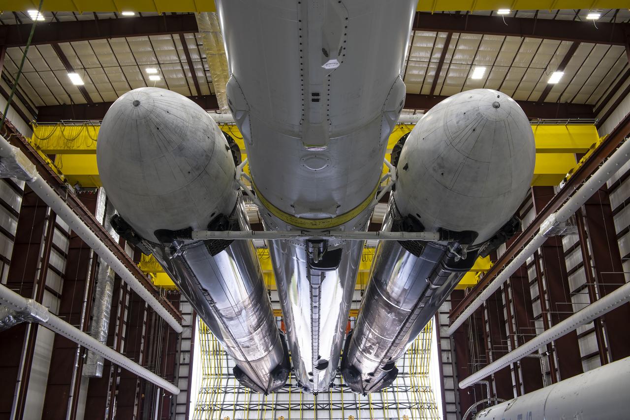 Photos of the Falcon Heavy rocket that will launch NASA's Psyche mission in the hangar at Launch Complex 39A at Kennedy Space Center in Florida before it rolled out to the pad for a static fire test as part of preparations for the journey to a metal-rich asteroid. 