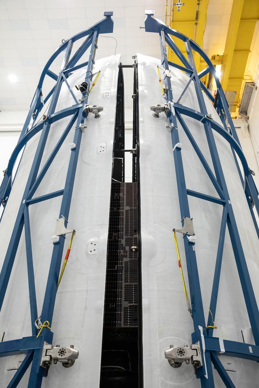 Technicians encapsulate NASA’s Psyche spacecraft in its payload fairings – the cone at the top of the rocket – at the Astrotech Space Operations facility in Titusville, Florida, on Tuesday, Oct. 3, 2023. Next, the spacecraft will move to SpaceX facilities at NASA’s Kennedy Space Center. Bound for a metal-rich asteroid of the same name, the Psyche mission is targeting Thursday, Oct. 12, to launch from Kennedy. Liftoff, atop a SpaceX Falcon Heavy rocket, is targeted for 10:16 a.m. EDT from Launch Complex 39A. 