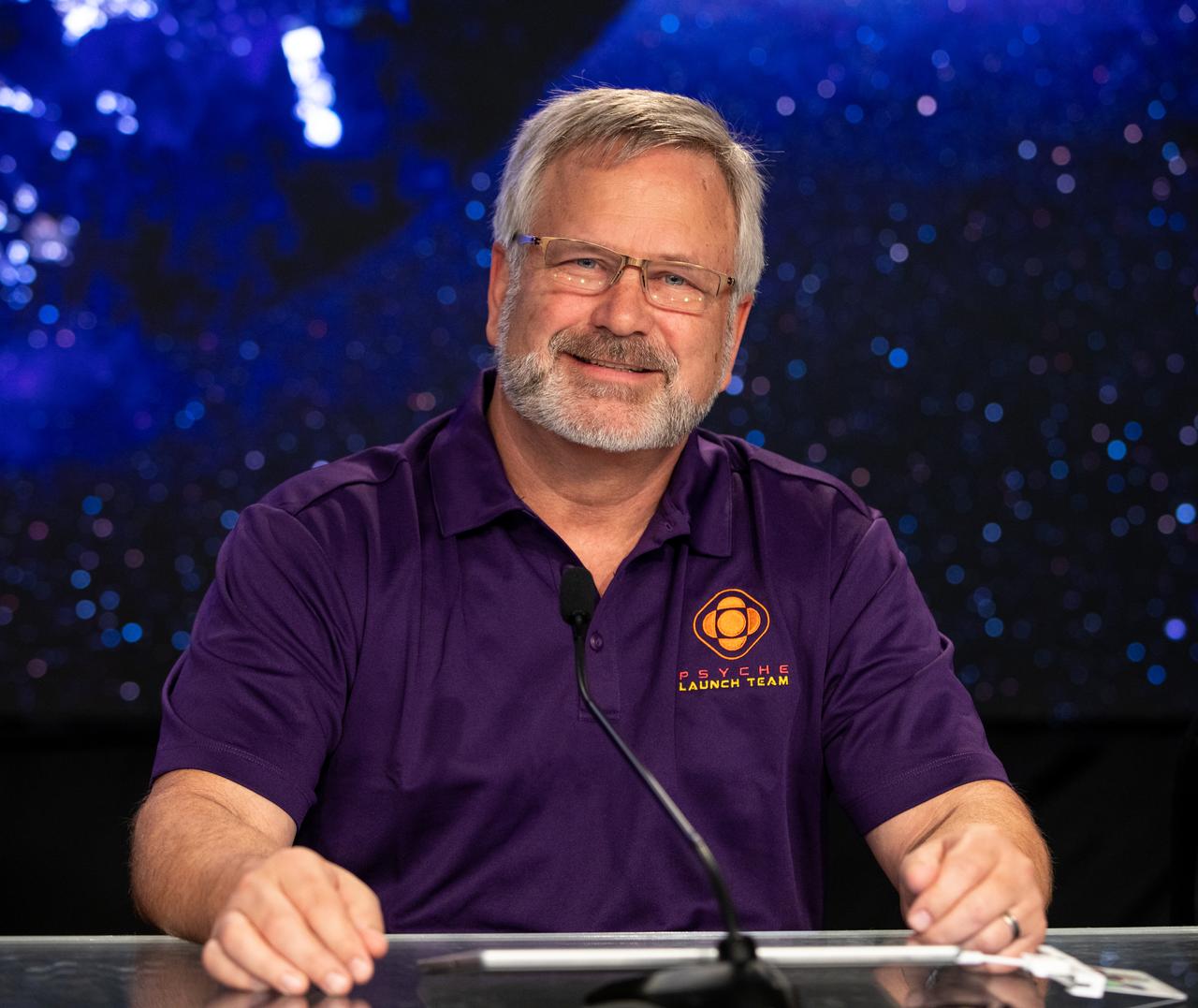 Henry Stone, Psyche project manager, NASA’s Jet Propulsion Laboratory, participates in a Psyche mission prelaunch news conference at NASA’s Kennedy Space Center in Florida on Wednesday, Oct. 11, 2023. Psyche is the first mission to explore an asteroid with a surface that likely contains substantial amounts of metal rather than rock or ice. Liftoff of NASA’s Psyche spacecraft, atop a SpaceX Falcon Heavy rocket, is targeted for 10:16 a.m. EDT Thursday, Oct. 12, from Kennedy’s Launch Complex 39A.