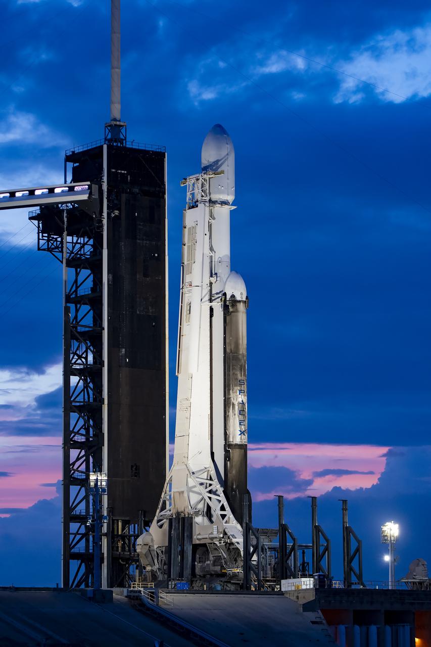 NASA’s Psyche spacecraft stands tall atop a SpaceX Falcon Heavy rocket at Kennedy Space Center’s historic Launch Complex 39A in Florida on Thursday, Oct. 12, 2023. Liftoff of Psyche is targeted for 10:19 a.m. EDT Friday, Oct. 13. The mission will explore an asteroid that scientists hope will help solve mysteries of our solar system for the benefit of humanity. This includes, for the first time, examining a world dominantly made not of rock or ice, but of metal, to answer fundamental questions about Earth’s own metal core and the formation of our solar system. Psyche also will carry a technology demonstration – NASA’s Deep Space Optical Communications (DSOC) experiment – that will test a next-generation way to communicate from space.
