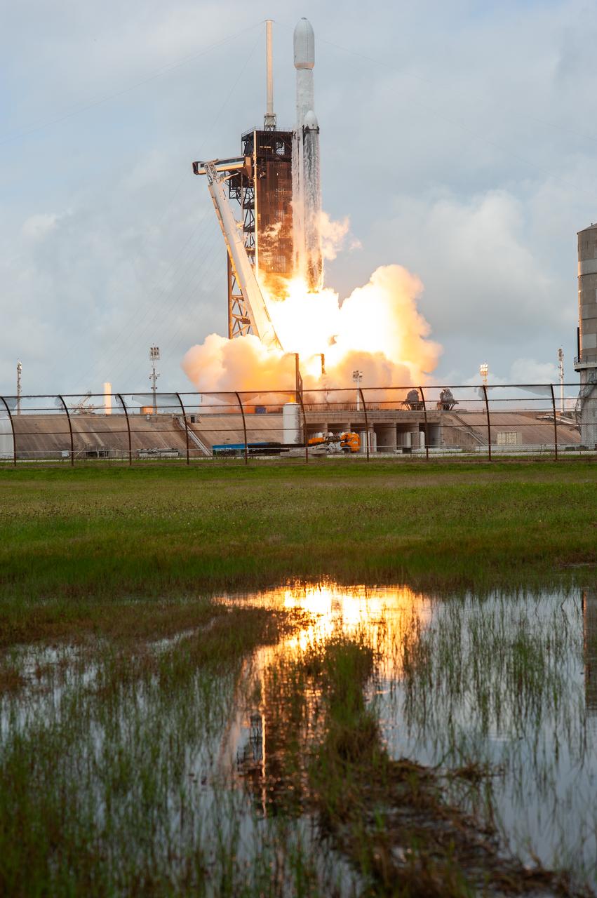 NASA’s Psyche spacecraft, atop a SpaceX Falcon Heavy rocket, lifts off from Kennedy Space Center’s historic Launch Complex 39A in Florida at 10:19 a.m. EDT on Friday, Oct. 13, 2023. The Psyche mission will study a metal-rich asteroid with the same name, located in the main asteroid belt between Mars and Jupiter. This is NASA’s first mission to study an asteroid that has more metal than rock or ice. Riding with Psyche is a pioneering technology demonstration – NASA’s Deep Space Optical Communications (DSOC) experiment – which will be the first test of laser communications beyond the Moon.