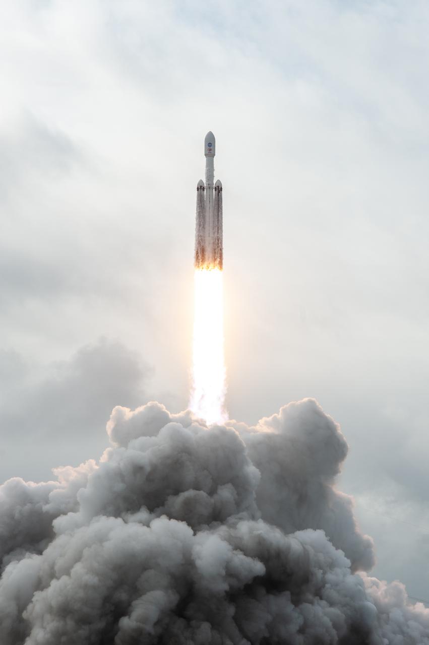 NASA’s Psyche spacecraft, atop a SpaceX Falcon Heavy rocket, soars into the sky after lifting off from Kennedy Space Center’s historic Launch Complex 39A in Florida at 10:19 a.m. EDT on Friday, Oct. 13, 2023. The Psyche mission will study a metal-rich asteroid with the same name, located in the main asteroid belt between Mars and Jupiter. This is NASA’s first mission to study an asteroid that has more metal than rock or ice. Riding with Psyche is a pioneering technology demonstration – NASA’s Deep Space Optical Communications (DSOC) experiment – which will be the first test of laser communications beyond the Moon.