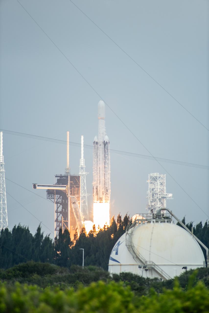 NASA’s Psyche spacecraft, atop a SpaceX Falcon Heavy rocket, lifts off from Kennedy Space Center’s historic Launch Complex 39A in Florida at 10:19 a.m. EDT on Friday, Oct. 13, 2023. The Psyche mission will study a metal-rich asteroid with the same name, located in the main asteroid belt between Mars and Jupiter. This is NASA’s first mission to study an asteroid that has more metal than rock or ice. Riding with Psyche is a pioneering technology demonstration – NASA’s Deep Space Optical Communications (DSOC) experiment – which will be the first test of laser communications beyond the Moon.