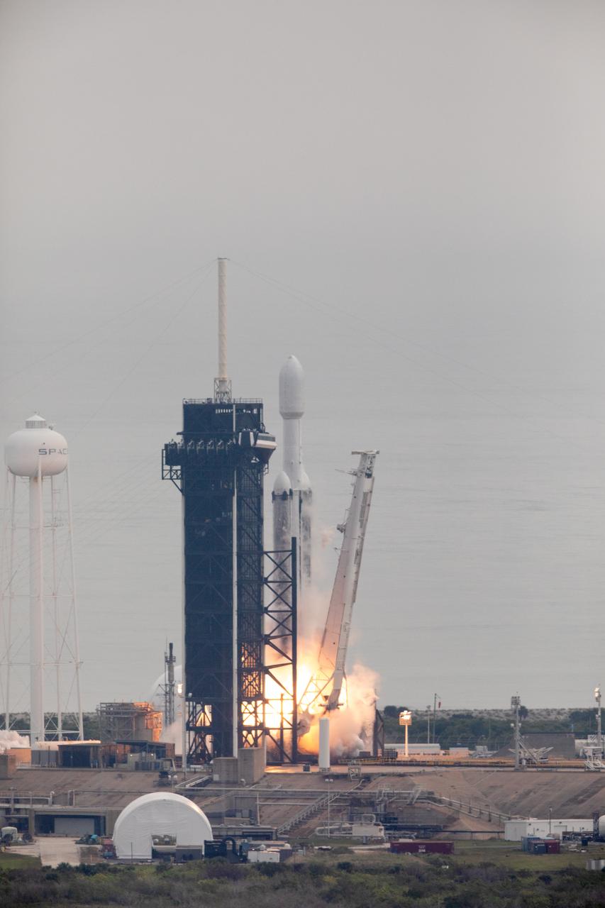 NASA’s Psyche spacecraft, atop a SpaceX Falcon Heavy rocket, lifts off from Kennedy Space Center’s historic Launch Complex 39A in Florida at 10:19 a.m. EDT on Friday, Oct. 13, 2023. The Psyche mission will study a metal-rich asteroid with the same name, located in the main asteroid belt between Mars and Jupiter. This is NASA’s first mission to study an asteroid that has more metal than rock or ice. Riding with Psyche is a pioneering technology demonstration – NASA’s Deep Space Optical Communications (DSOC) experiment – which will be the first test of laser communications beyond the Moon.