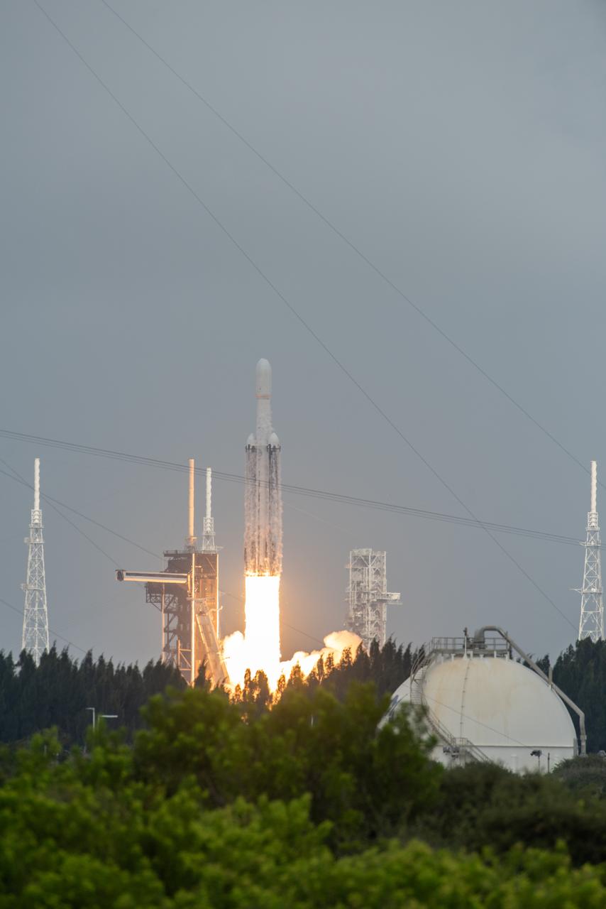 NASA’s Psyche spacecraft, atop a SpaceX Falcon Heavy rocket, lifts off from Kennedy Space Center’s historic Launch Complex 39A in Florida at 10:19 a.m. EDT on Friday, Oct. 13, 2023. The Psyche mission will study a metal-rich asteroid with the same name, located in the main asteroid belt between Mars and Jupiter. This is NASA’s first mission to study an asteroid that has more metal than rock or ice. Riding with Psyche is a pioneering technology demonstration – NASA’s Deep Space Optical Communications (DSOC) experiment – which will be the first test of laser communications beyond the Moon.