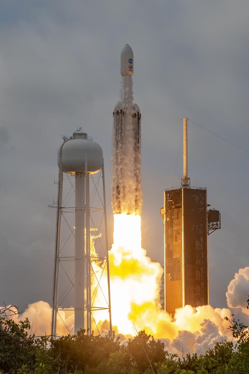NASA’s Psyche spacecraft, atop a SpaceX Falcon Heavy rocket, lifts off from Kennedy Space Center’s historic Launch Complex 39A in Florida at 10:19 a.m. EDT on Friday, Oct. 13, 2023. The Psyche mission will study a metal-rich asteroid with the same name, located in the main asteroid belt between Mars and Jupiter. This is NASA’s first mission to study an asteroid that has more metal than rock or ice. Riding with Psyche is a pioneering technology demonstration – NASA’s Deep Space Optical Communications (DSOC) experiment – which will be the first test of laser communications beyond the Moon.