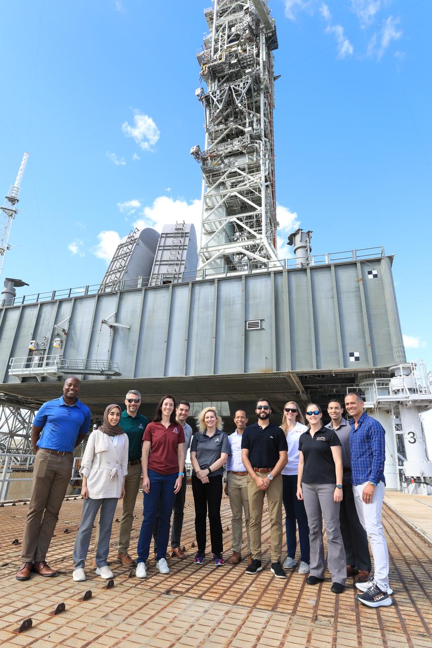 NASA’s 2021 class of astronaut candidates visit the mobile launcher at Launch Complex 39B during a familiarization tour of facilities on Monday, Oct. 16, 2023, at the agency’s Kennedy Space Center in Florida. 