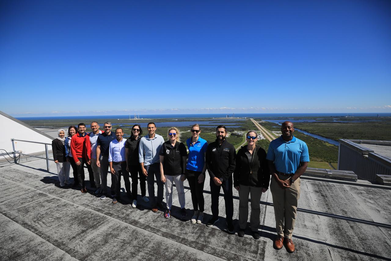 NASA’s 2021 class of astronaut candidates pose for a photograph on the roof of the Vehicle Assembly Building during a familiarization tour of facilities on Tuesday, Oct. 17, 2023, at the agency’s Kennedy Space Center in Florida. 