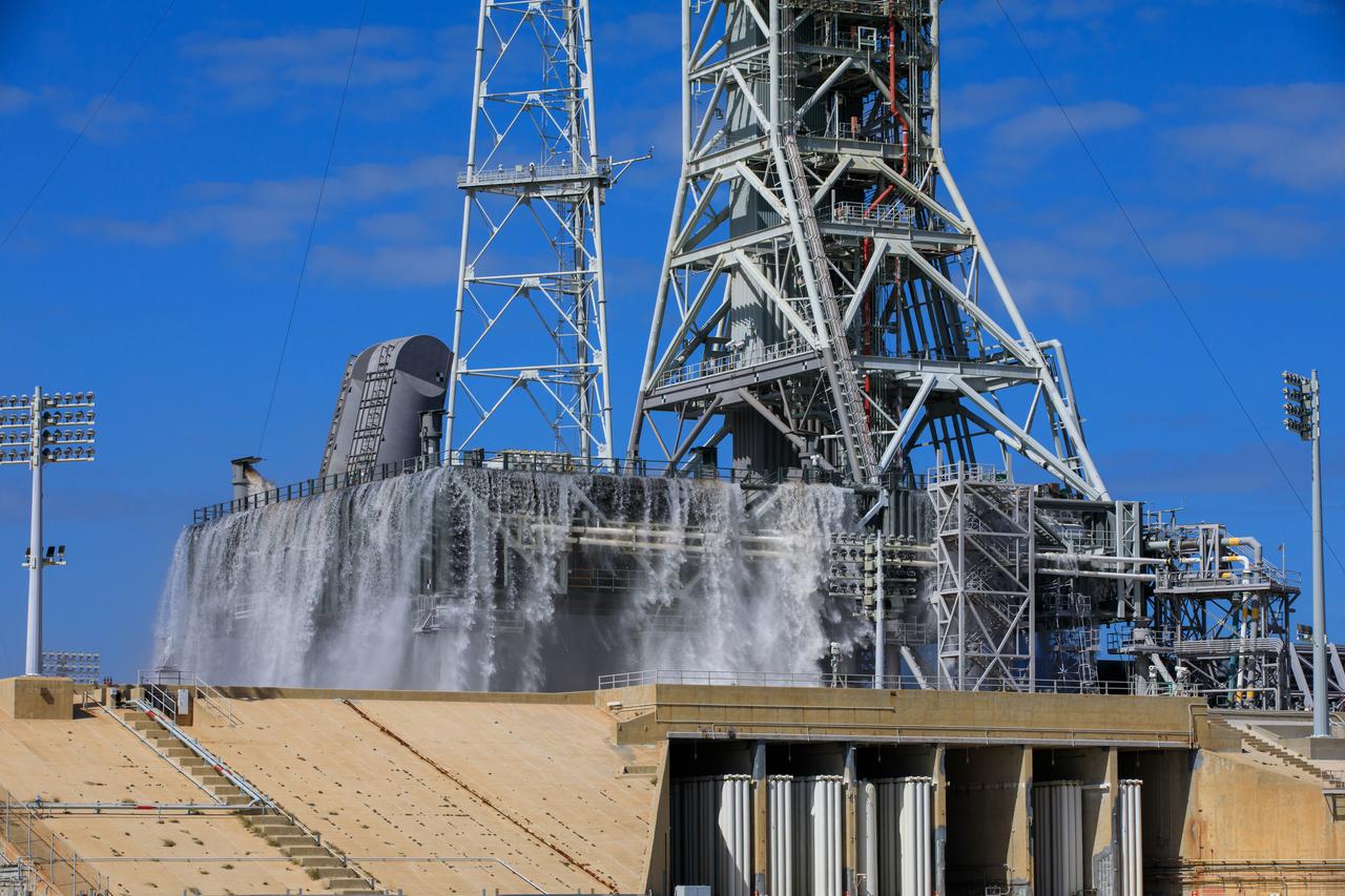 NASA’s Exploration Ground Systems conducts a water flow test with the mobile launcher at Kennedy Space Center’s Launch Complex 39B in Florida on Oct. 24, 2023. It is the third in a series of tests to verify the overpressure protection and sound suppression system is ready for launch of the Artemis II mission. During liftoff, 400,000 gallons of water will rush onto the pad to help protect NASA’s SLS (Space Launch System) rocket, Orion spacecraft, mobile launcher, and launch pad from any over pressurization and extreme sound produced during ignition and liftoff.