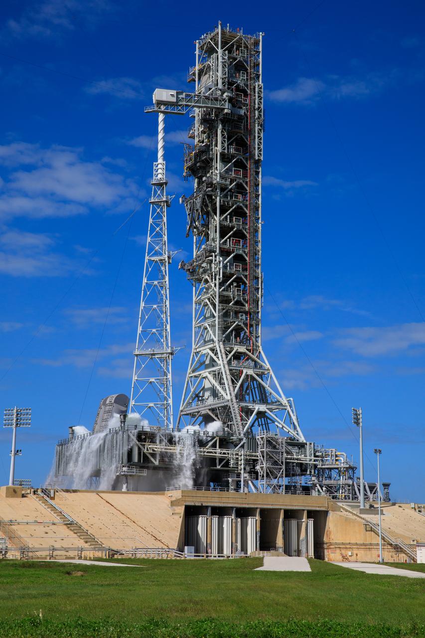 NASA’s Exploration Ground Systems conducts a water flow test with the mobile launcher at Kennedy Space Center’s Launch Complex 39B in Florida on Oct. 24, 2023. It is the third in a series of tests to verify the overpressure protection and sound suppression system is ready for launch of the Artemis II mission. During liftoff, 400,000 gallons of water will rush onto the pad to help protect NASA’s SLS (Space Launch System) rocket, Orion spacecraft, mobile launcher, and launch pad from any over pressurization and extreme sound produced during ignition and liftoff.