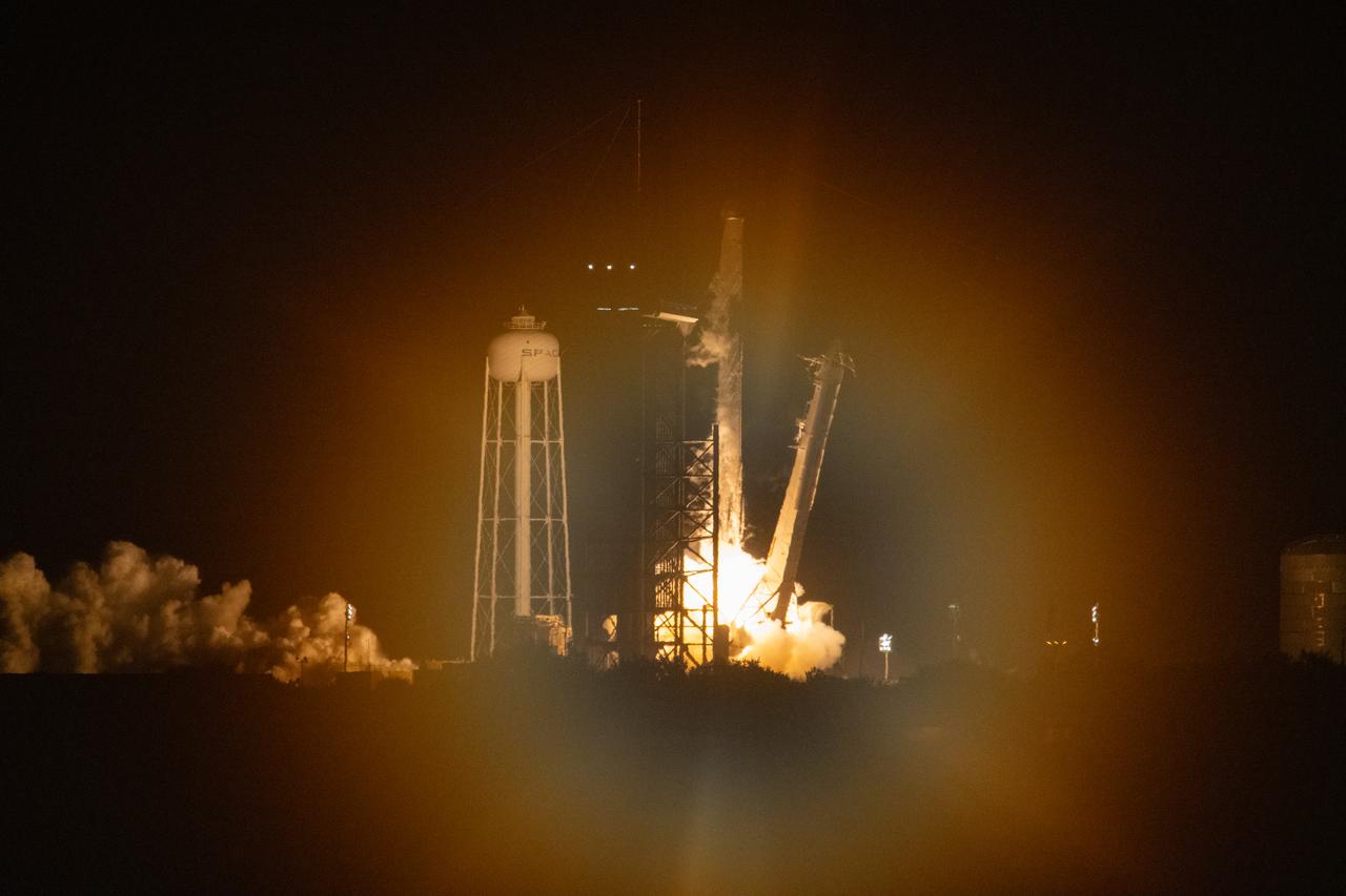 The SpaceX Falcon 9 rocket carrying the Dragon spacecraft lifts off from Launch Complex 39A at NASA’s Kennedy Space Center in Florida on Thursday, Nov. 9, 2023, on the company’s 29th commercial resupply services mission for the agency to the International Space Station. Liftoff was at 8:28 p.m. EST. Dragon will deliver scientific research, technology demonstrations, crew supplies, and hardware to the space station to support its Expedition 70 crew, including NASA’s Integrated Laser Communications Relay Demonstration Low Earth Orbit User Modem and Amplifier Terminal (ILLUMA-T) and Atmospheric Waves Experiment (AWE). The spacecraft is expected to spend about a month attached to the orbiting outpost before it returns to Earth with research and return cargo, splashing down off the coast of Florida.