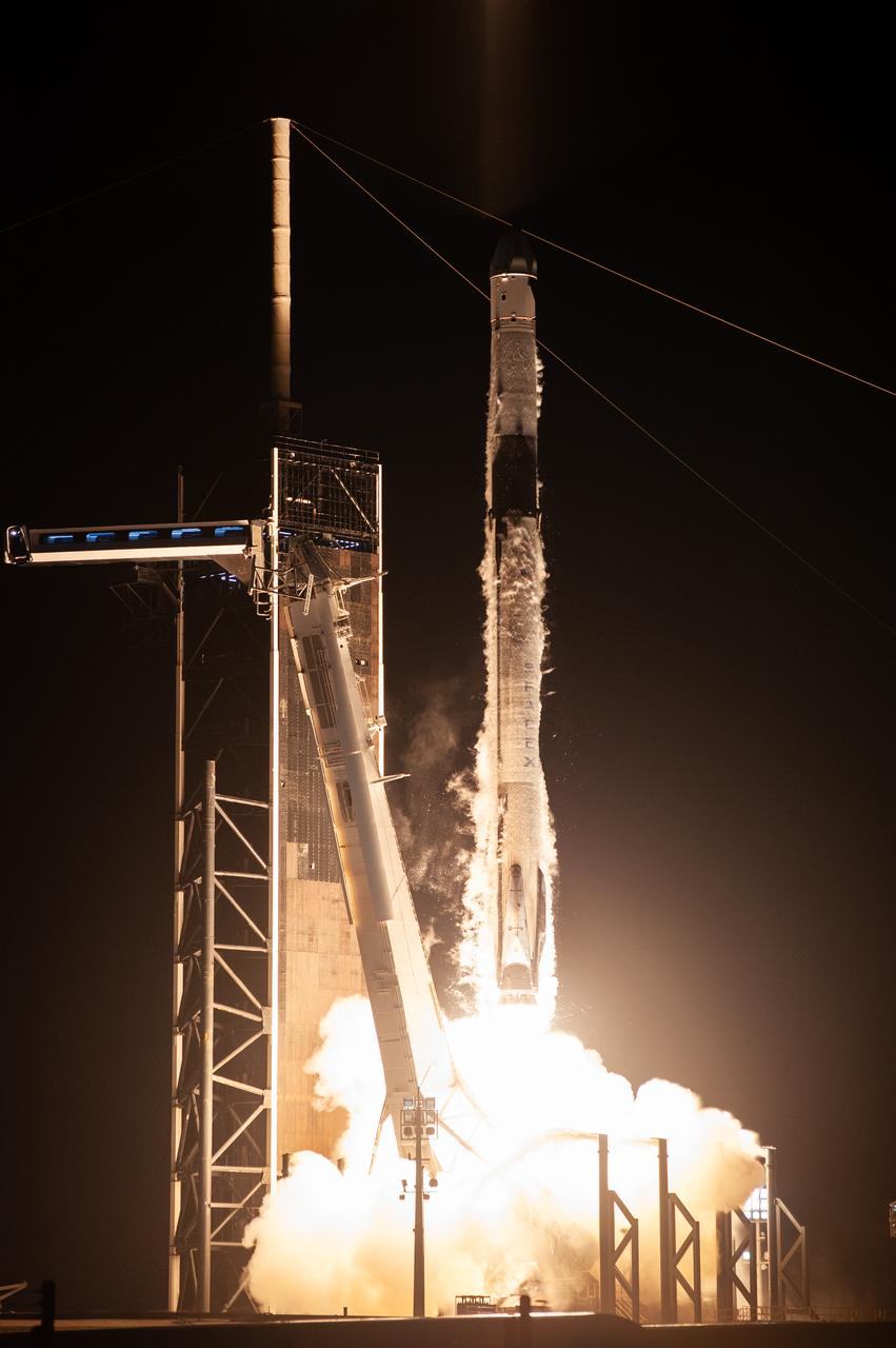 The SpaceX Falcon 9 rocket carrying the Dragon spacecraft lifts off from Launch Complex 39A at NASA’s Kennedy Space Center in Florida on Thursday, Nov. 9, 2023, on the company’s 29th commercial resupply services mission for the agency to the International Space Station. Liftoff was at 8:28 p.m. EST. Dragon will deliver scientific research, technology demonstrations, crew supplies, and hardware to the space station to support its Expedition 70 crew, including NASA’s Integrated Laser Communications Relay Demonstration Low Earth Orbit User Modem and Amplifier Terminal (ILLUMA-T) and Atmospheric Waves Experiment (AWE). The spacecraft is expected to spend about a month attached to the orbiting outpost before it returns to Earth with research and return cargo, splashing down off the coast of Florida.