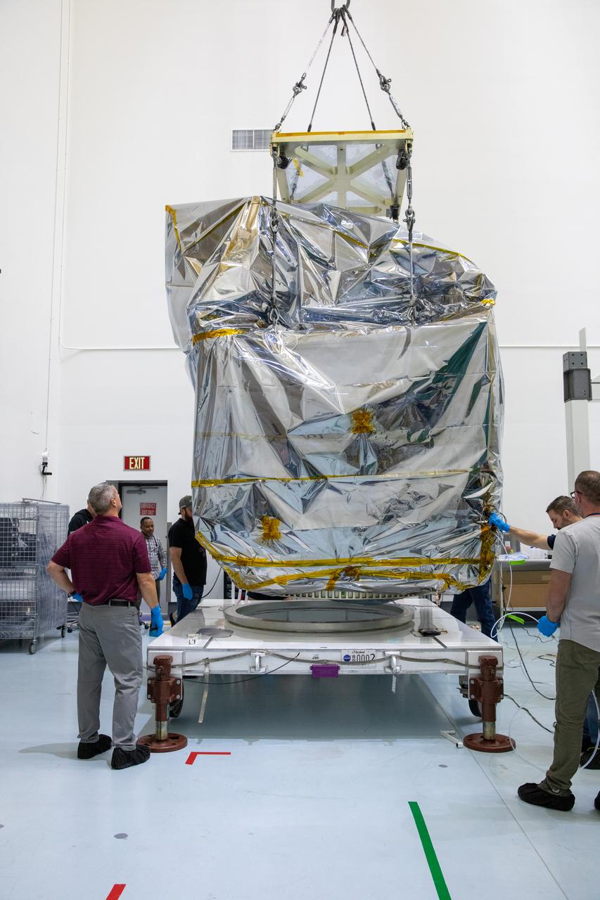 NASA’s Plankton, Aerosol, Cloud, ocean Ecosystem (PACE) observatory spacecraft is uncrated for prelaunch processing at the Astrotech Space Operations Facility near the agency’s Kennedy Space Center in Florida on Wednesday, Nov. 15, 2023. The PACE observatory will help us better understand how the ocean and atmosphere exchange carbon dioxide, measure key atmospheric variables associated with air quality and Earth's climate, and monitor ocean health, in part by studying phytoplankton, tiny plants and algae that sustain the marine food web. PACE will be encapsulated for launch aboard a SpaceX Falcon 9 rocket from Space Launch Complex 40 at Cape Canaveral Space Force Station in Florida.