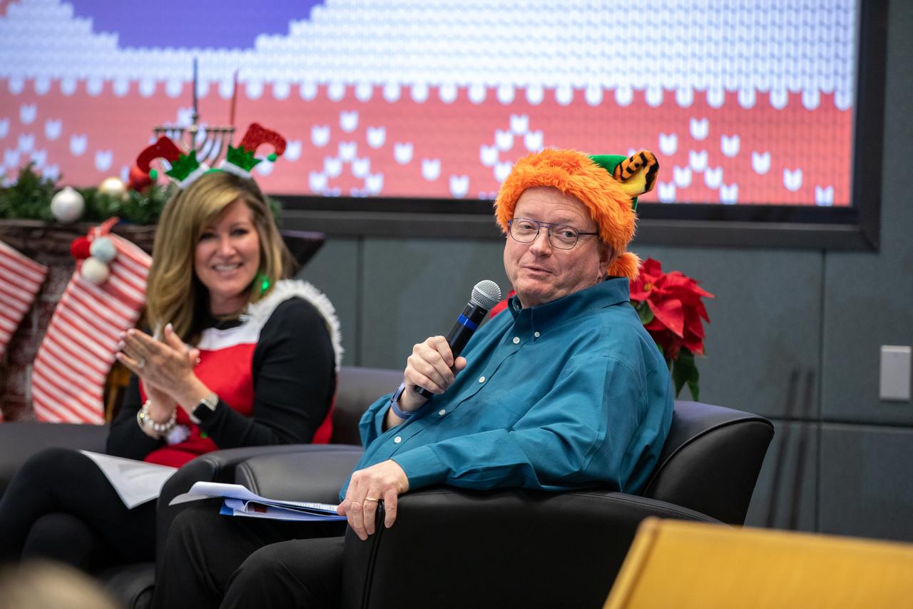 From left, Jennifer Kunz, associate director, technical, and Burt Summerfield, associate director, management, at NASA’s Kennedy Space Center in Florida participate in an employee town hall meeting held on Thursday, Dec. 7, 2023, at Kennedy’s Operations Support Building II. Center Director Janet Petro and other executive leadership hosted the meeting to provide updates on center milestones, celebrate the year’s achievements, and answer questions from the workforce.  