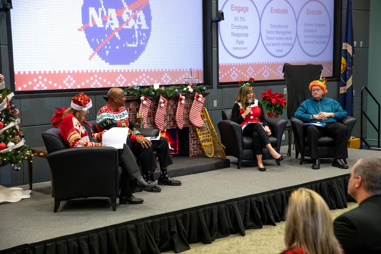 From left, NASA’s Kennedy Space Center Director Janet Petro, Kennedy Space Center Deputy Director Kelvin Manning, Kennedy Space Center Associate Director, Technical, Jennifer Kunz, and Kennedy Space Center Associate Director of Management Burt Summerfield participate in an employee town hall meeting held on Thursday, Dec. 7, 2023, at Kennedy’s Operations Support Building II. Kennedy’s executive leadership team donned holiday sweaters and competed for the title of “most festive” as they provided updates on center milestones, celebrated the year’s achievements, and answered questions from the workforce.  