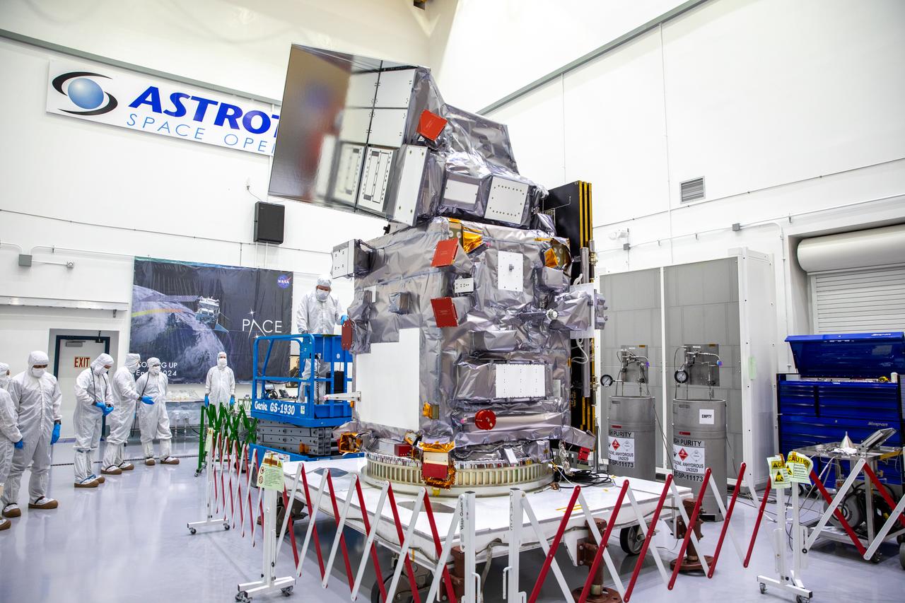 NASA invited members of the media to view NASA’s PACE (Plankton, Aerosol, Cloud, ocean Ecosystem) spacecraft inside a cleanroom at the Astrotech Space Operations Facility near the agency’s Kennedy Space Center in Florida on Wednesday, Jan. 3, 2024. PACE will collect data on how the ocean and atmosphere exchange carbon dioxide, measure key atmospheric variables associated with air quality and Earth's climate, and monitor ocean health. The spacecraft is scheduled to launch aboard a SpaceX Falcon 9 rocket no earlier than Tuesday, Feb. 6, 2024, from Space Launch Complex 40 at Cape Canaveral Space Force Station in Florida. 