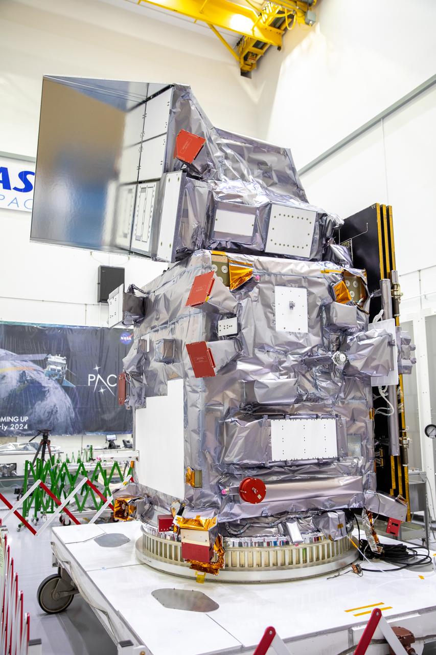 NASA’s PACE (Plankton, Aerosol, Cloud, ocean Ecosystem) spacecraft is pictured during pre-launch processing on Wednesday, Jan. 3, 2024, inside a cleanroom at the Astrotech Space Operations Facility near the agency’s Kennedy Space Center in Florida. NASA invited members of the media to speak with mission subject matter experts and view the spacecraft before it is encapsulated into its payload fairing for its launch aboard a SpaceX Falcon 9 rocket no earlier than Tuesday, Feb. 6, 2024, from Space Launch Complex 40 at Cape Canaveral Space Force Station in Florida.