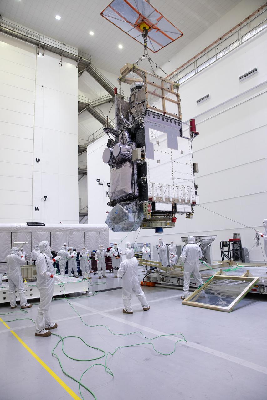 Technicians monitor movement as a crane hoists NOAA’s Geostationary Operational Environmental Satellite-U (GOES-U) after being uncrated and rotated into a vertical position on Wednesday, Jan. 24, 2024, at the Astrotech Space Operations Facility near the agency’s Kennedy Space Center in Florida. Part of a collaborative NOAA and NASA program, GOES-U is the fourth in a series of four advanced geostationary weather satellites. Data from the GOES satellite constellation – consisting of the GOES-R, GOES-S, GOES-T and GOES-U spacecraft – enables forecasters to predict, observe, and track local weather events that affect public safety like thunderstorms, hurricanes, and wildfires.