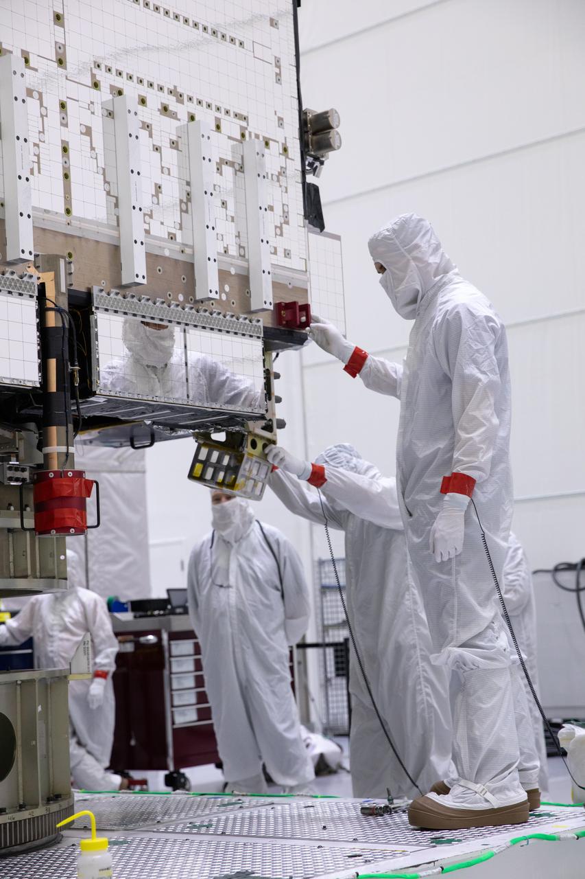 Technicians monitor movement and guide NOAA’s Geostationary Operational Environmental Satellite-U (GOES-U) as a crane hoists it on to a spacecraft dolly in a high bay at the Astrotech Space Operations Facility near the agency’s Kennedy Space Center in Florida. Part of a collaborative NOAA and NASA program, GOES-U is the fourth in a series of four advanced geostationary weather satellites. Data from the GOES satellite constellation – consisting of the GOES-R, GOES-S, GOES-T and GOES-U spacecraft – enables forecasters to predict, observe, and track local weather events that affect public safety like thunderstorms, hurricanes, and wildfires.