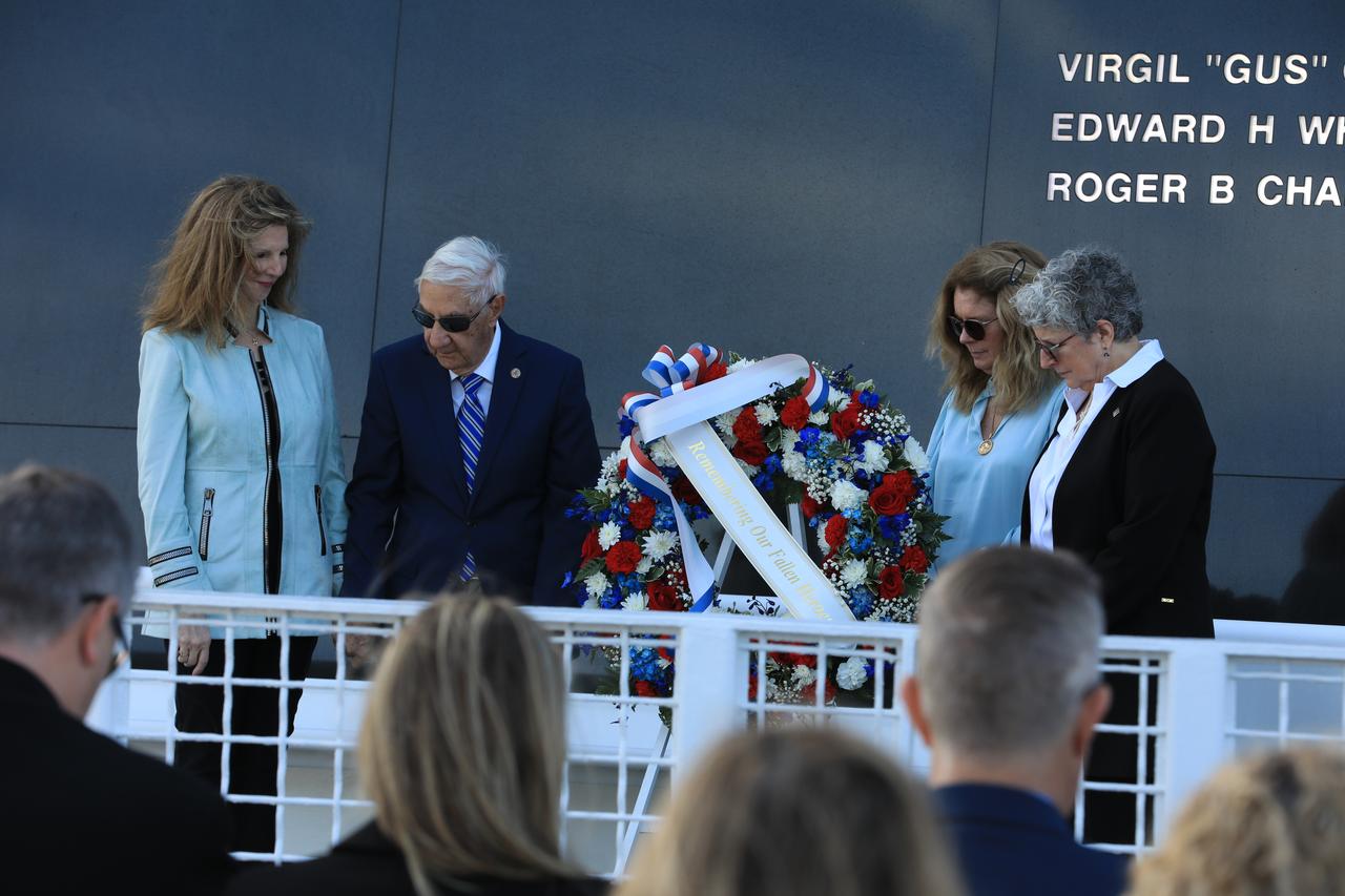 Family members of fallen astronauts Kathie Scobee Fulgham, Lowell Grissom, Sheryl Chaffee, and Karen Bassett Stevenson place a wreath at the Space Mirror Memorial at NASA’s Kennedy Space Center Visitor Complex in Florida on Thursday, Jan. 25, 2024, during the agency’s Day of Remembrance. The annual tradition pays tribute to fallen astronauts and astronaut candidates who lost their lives while furthering the cause of exploration and discovery, including the crews of Apollo 1, Challenger STS-51L, and Columbia STS-107.