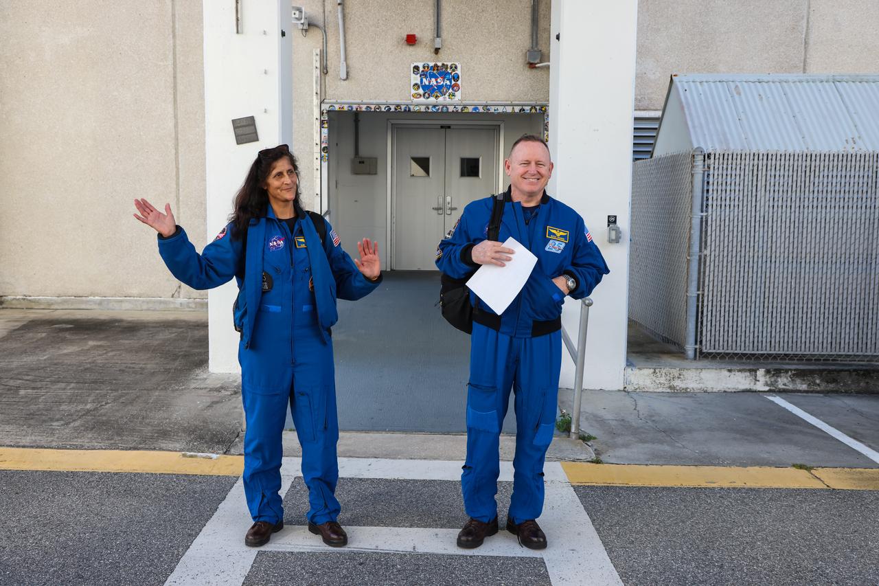 NASA astronauts Suni Williams and Barry “Butch” Wilmore emerge from the Neil Armstrong Operations and Checkout Building at the agency’s Kennedy Space Center in Florida on Wednesday, Jan. 31, 2024, as part of an integrated crew exercise simulation for NASA’s Boeing Crew Flight Test (CFT). The integrated exercise involved participation from the flight crew, NASA, Boeing, and United Launch Alliance (ULA), and allowed teams to rehearse prelaunch operations beginning roughly four hours before a targeted liftoff. CFT will be the first flight with astronauts to the International Space Station for Boeing’s Starliner spacecraft as part of NASA’s Commercial Crew Program. Starliner is scheduled to launch atop ULA’s Atlas V rocket no earlier than mid-April 2024.