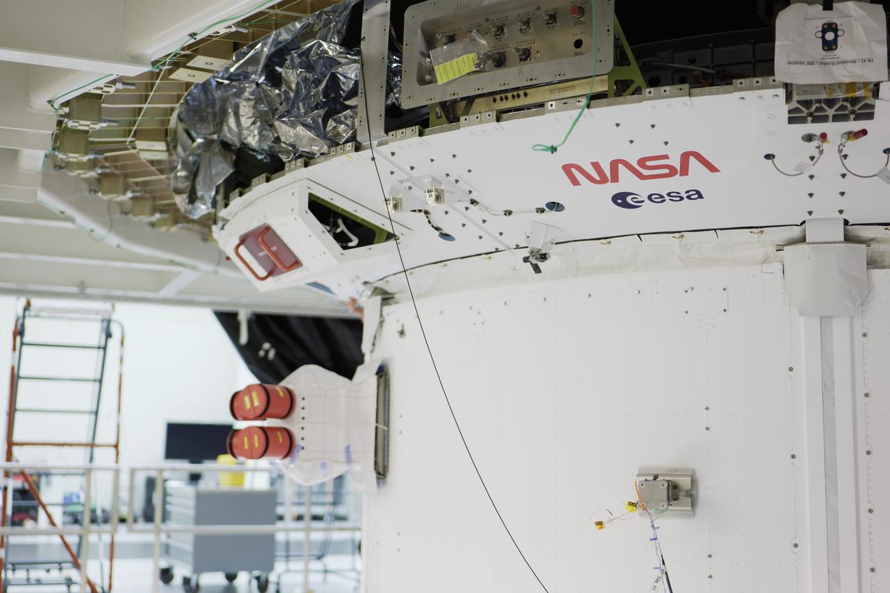 The Orion spacecraft for NASA’s Artemis II mission received its latest makeover. Teams adhered the agency’s iconic “worm” logo and ESA (European Space Agency) insignia on the spacecraft’s crew module adapter on Sunday, Jan. 28, inside the Neil Armstrong Operations and Checkout Building at NASA’s Kennedy Space Center in Florida.