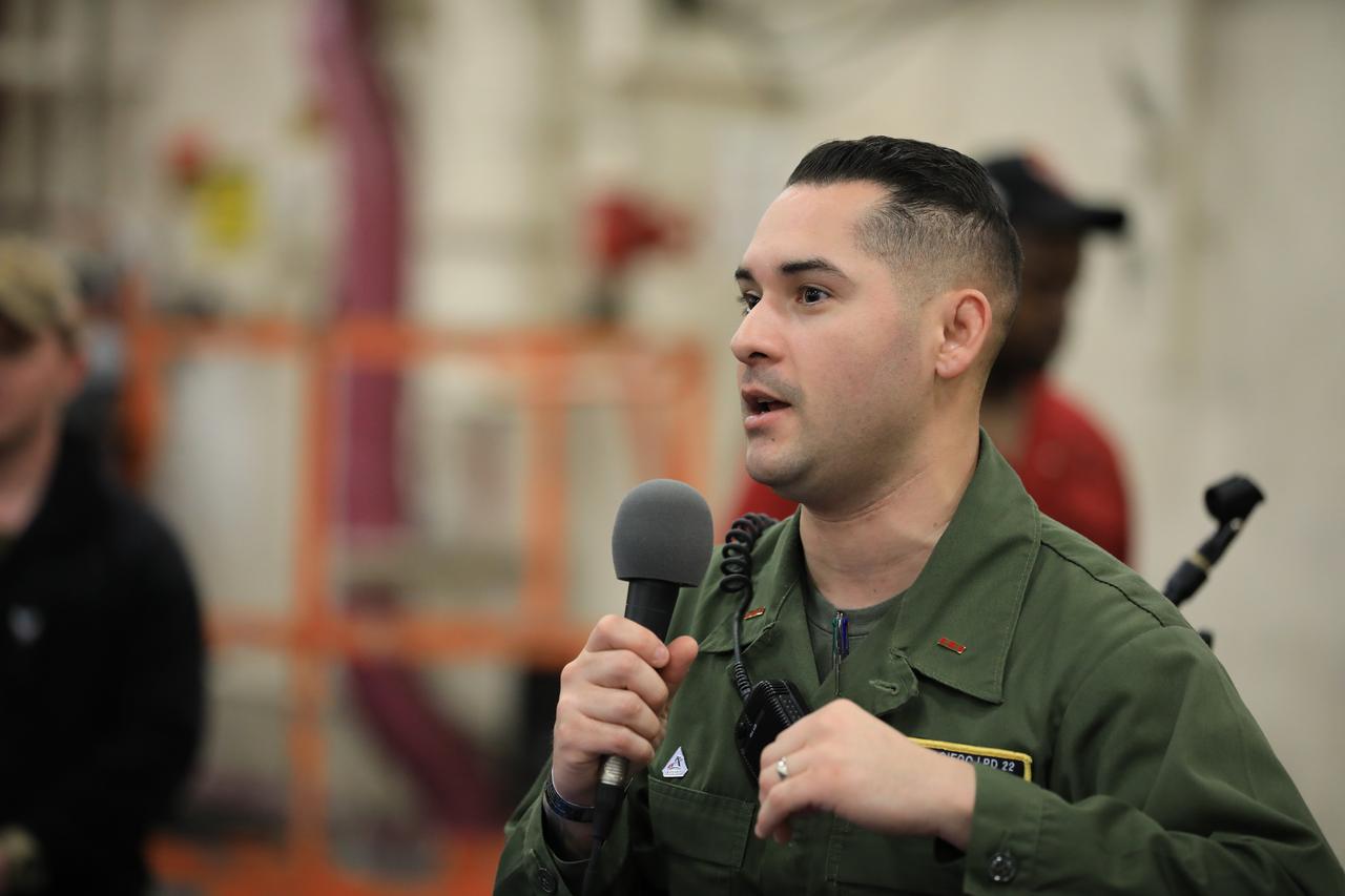 Members of NASA’s Exploration Ground System’s Landing and Recovery team and partners from the Department of Defense aboard the USS San Diego participate in a ship rider briefing on the flight deck prior to departure from Naval Base San Diego on Feb. 21. During this test campaign, teams will practice recovery procedures using the Crew Module Test Article, during Underway Recovery Test 11 (URT-11) off the coast of San Diego. URT-11 is the eleventh in a series of Artemis recovery tests, but the first time NASA and its partners from the Department of Defense put their Artemis II recovery procedures to the test with the astronauts.
