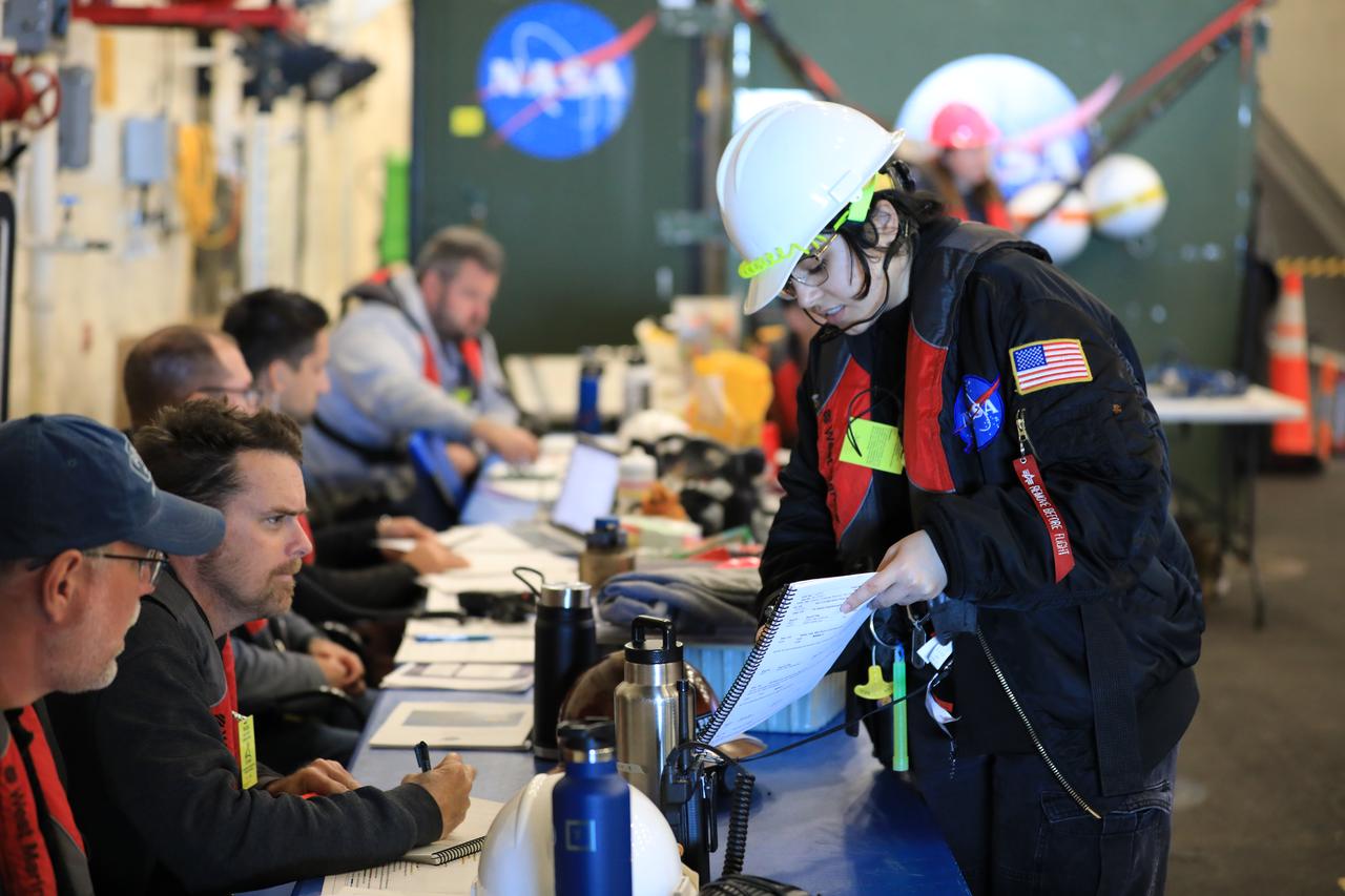 Members of NASA’s Exploration Ground System’s Landing and Recovery team and partners from the Department of Defense aboard the USS San Diego monitor operations of the day in the ship’s well deck and practice recovery procedures using the Crew Module Test Article, during Underway Recovery Test 11 (URT-11) off the coast of San Diego on Thursday, Feb. 22, 2024. URT-11 is the eleventh in a series of Artemis recovery tests, and the first time NASA and its partners put their Artemis II recovery procedures to the test with the astronauts.