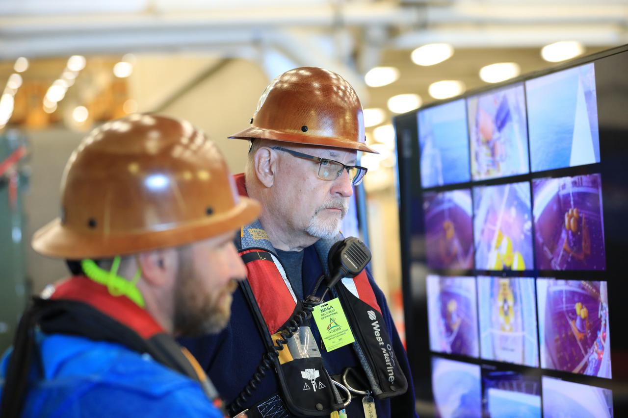 Members of NASA’s Exploration Ground System’s Landing and Recovery team and partners from the Department of Defense aboard the USS San Diego monitor operations of the day in the ship’s well deck and practice recovery procedures using the Crew Module Test Article, during Underway Recovery Test 11 (URT-11) off the coast of San Diego on Thursday, Feb. 22, 2024. URT-11 is the eleventh in a series of Artemis recovery tests, and the first time NASA and its partners put their Artemis II recovery procedures to the test with the astronauts.