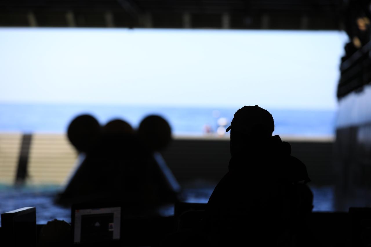 Members of NASA’s Exploration Ground System’s Landing and Recovery team and partners from the Department of Defense aboard the USS San Diego practice recovery procedures during Underway Recovery Test 11 (URT-11) off the coast of San Diego on Thursday, Feb. 22, 2024. The team works to secure the Crew Module Test Article and align it on its stand inside the ship’s well deck. URT-11 is the eleventh in a series of Artemis recovery tests, and the first time NASA and its partners put their Artemis II recovery procedures to the test with the astronauts.