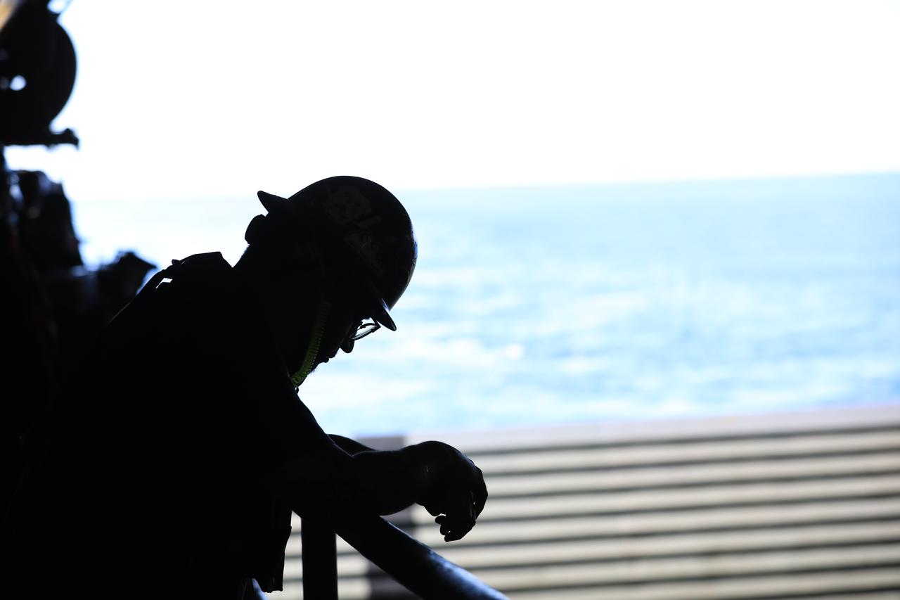 Members of NASA’s Exploration Ground System’s Landing and Recovery team and partners from the Department of Defense aboard the USS San Diego monitor operations of the day in the ship’s well deck and practice recovery procedures using the Crew Module Test Article, during Underway Recovery Test 11 (URT-11) off the coast of San Diego on Thursday, Feb. 22, 2024. URT-11 is the eleventh in a series of Artemis recovery tests, and the first time NASA and its partners put their Artemis II recovery procedures to the test with the astronauts.