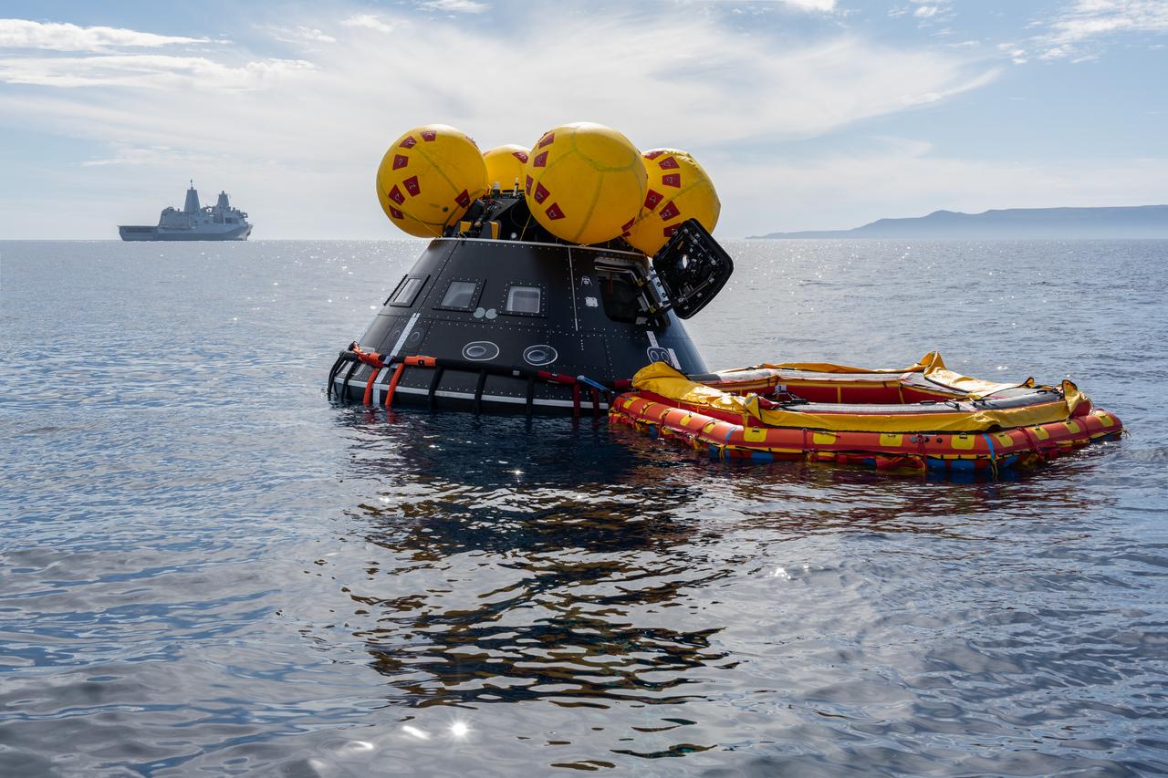 Members of NASA’s Exploration Ground System’s Landing and Recovery team and partners from the Department of Defense aboard the USS San Diego practice recovery procedures using the Crew Module Test Article with NASA Astronaut Candidate Chris Birch; Jenni Gibbons, CSA (Canadian Space Agency) astronaut; and two members of the United States Navy Helicopter Sea Combat Squadron 23, during Underway Recovery Test 11 (URT-11) off the coast of San Diego on Friday, Feb. 23, 2024. URT-11 is the eleventh in a series of Artemis recovery tests, and the first time NASA and its partners put their Artemis II recovery procedures to the test with the astronauts.