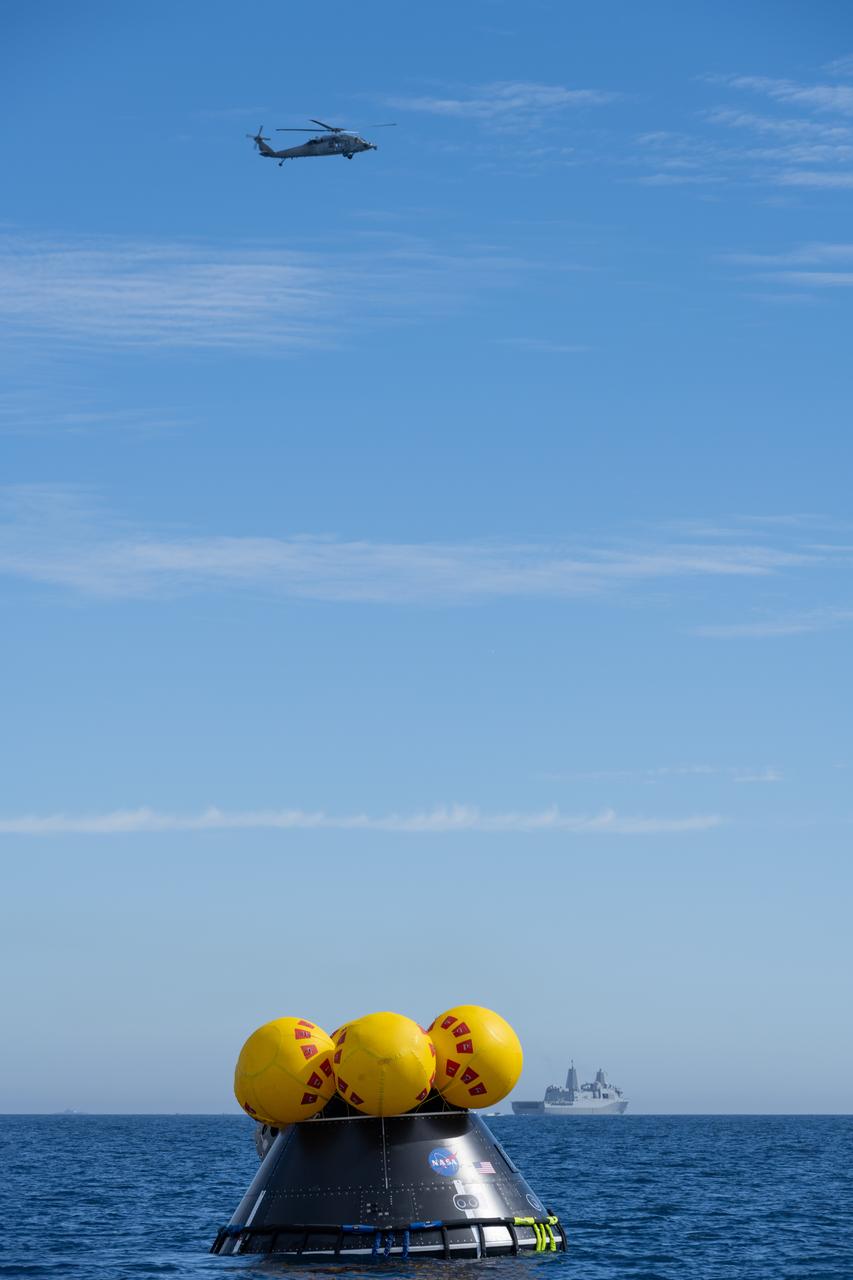 Members of NASA’s Exploration Ground System’s Landing and Recovery team and partners from the Department of Defense aboard the USS San Diego practice recovery procedures using the Crew Module Test Article with NASA Astronaut Candidate Chris Birch; Jenni Gibbons, CSA (Canadian Space Agency) astronaut; and two members of the United States Navy Helicopter Sea Combat Squadron 23, during Underway Recovery Test 11 (URT-11) off the coast of San Diego on Friday, Feb. 23, 2024. URT-11 is the eleventh in a series of Artemis recovery tests, and the first time NASA and its partners put their Artemis II recovery procedures to the test with the astronauts.