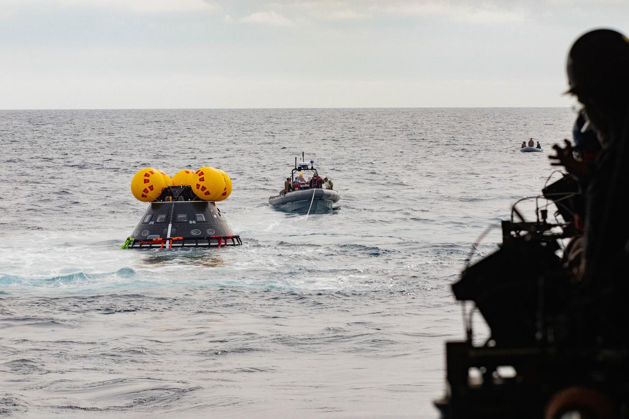 NASA’s Exploration Ground System’s Landing and Recovery team and partners from the Department of Defense aboard the USS San Diego practice recovery procedures using the Crew Module Test Article, during Underway Recovery Test 11 (URT-11) off the coast of San Diego, California on Sunday, Feb. 25, 2024. URT-11 is the eleventh in a series of Artemis recovery tests, and the first time NASA and its partners put their Artemis II recovery procedures to the test with the astronauts.