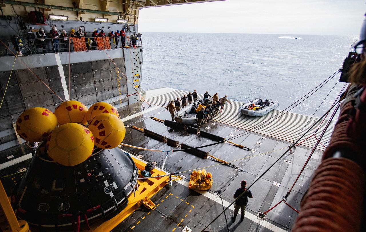 NASA’s Exploration Ground System’s Landing and Recovery team and partners from the Department of Defense aboard the USS San Diego practice recovery procedures using the Crew Module Test Article, during Underway Recovery Test 11 (URT-11) off the coast of San Diego, California on Sunday, Feb. 25, 2024. URT-11 is the eleventh in a series of Artemis recovery tests, and the first time NASA and its partners put their Artemis II recovery procedures to the test with the astronauts.