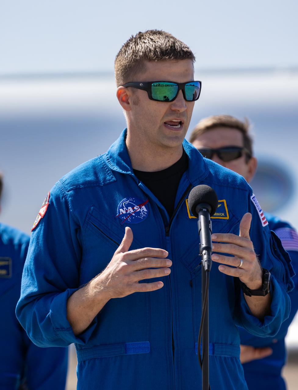 NASA astronaut Matthew Dominick, Crew-8 commander, delivers remarks to members of the news media during crew arrival for NASA’s SpaceX Crew-8 mission at the Launch and Landing Facility at Kennedy Space Center in Florida on Sunday, Feb. 25, 2024. Dominick, along with NASA astronauts Michael Barratt and Jeanette Epps, as well as Roscosmos cosmonaut Alexander Grebenkin, will launch to the International Space Station aboard SpaceX’s Dragon spacecraft on the company’s Falcon 9 rocket from Kennedy’s Launch Complex 39A no earlier than 12:04 a.m. EST Friday, March 1, 2024.